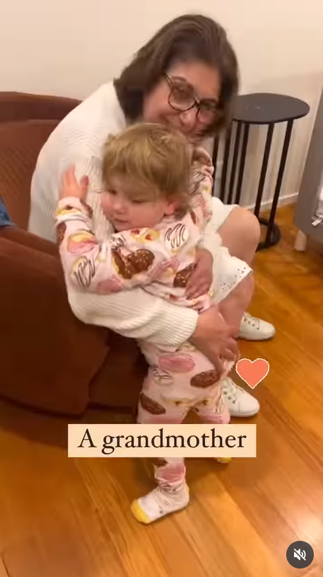 Susan hugging her granddaughter | Source: Instagram/kristyadlerart