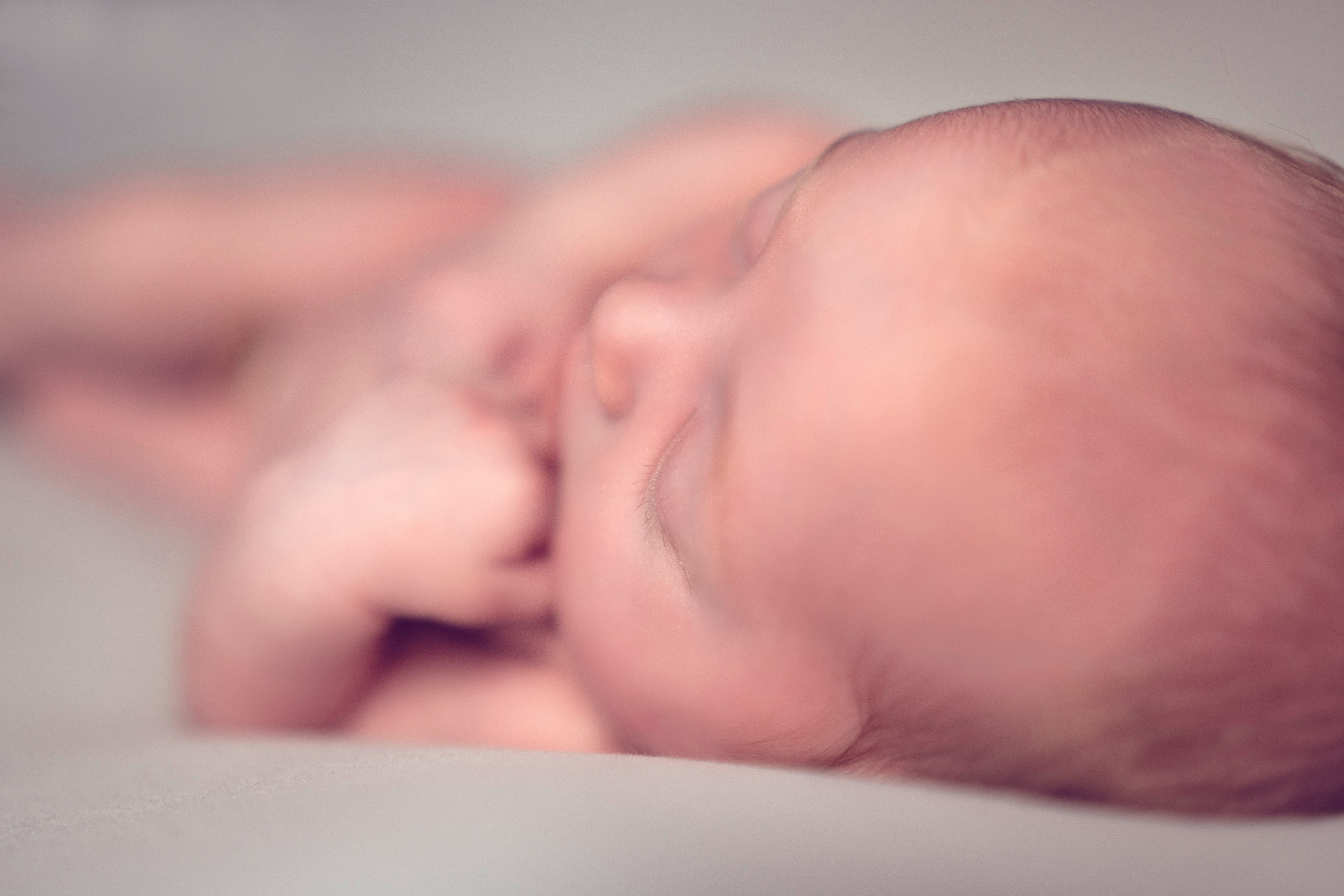 A blurry image of a newborn baby | Source: Unsplash
