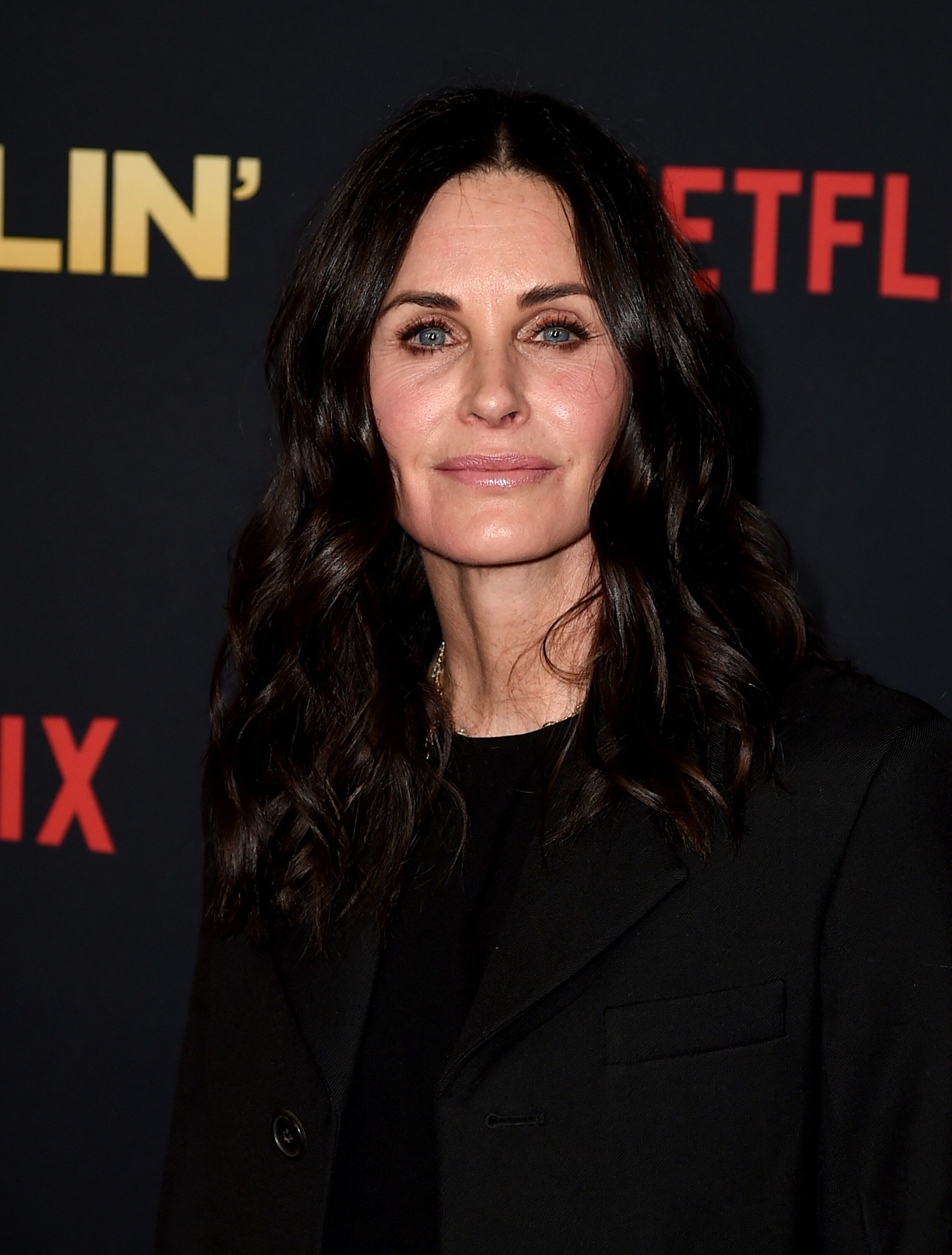 Courteney Cox arrives at the premiere of Netflix's "Dumplin'" at the Chinese Theater. | Source: Getty Images