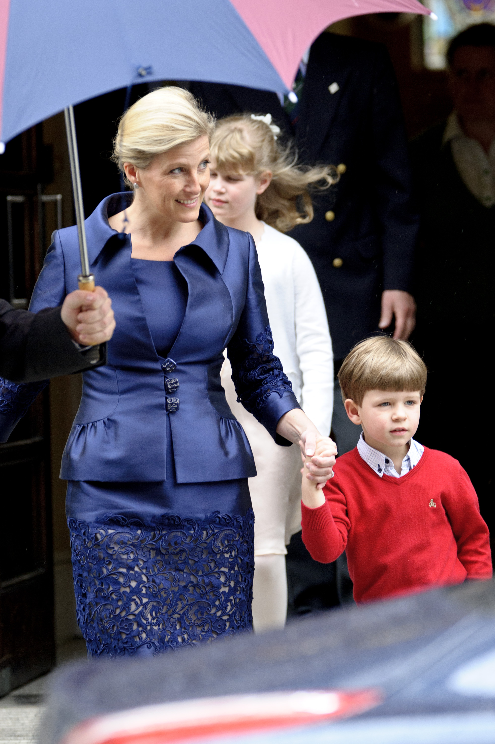Hand in hand with mum: Sophie arrives at King Edward VII Hospital with her young son James on 5 June 2012. The poignant visit came as Prince Philip, Duke of Edinburgh, was being treated inside — with Sophie balancing family life and royal duty with grace.