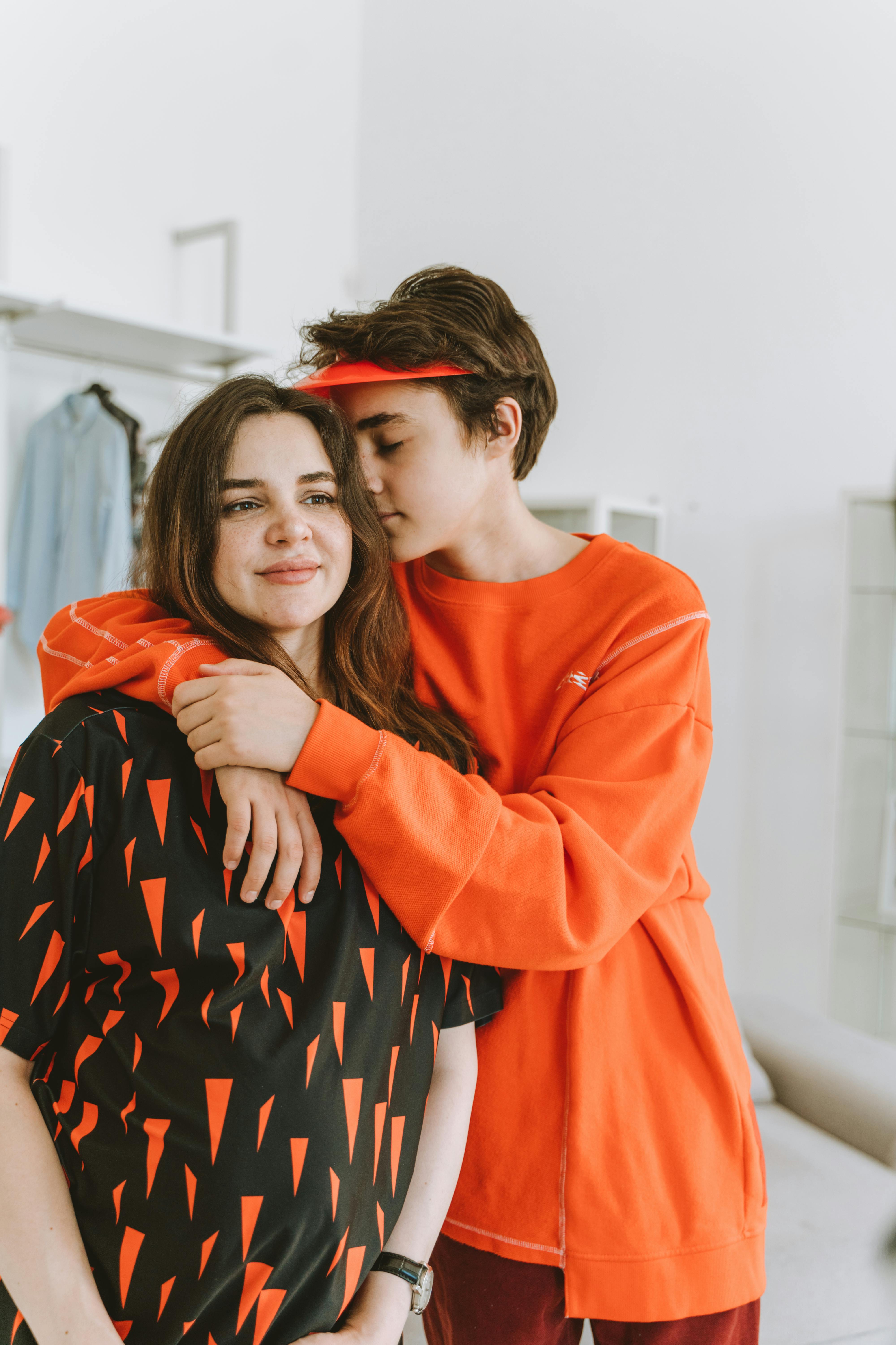 A young boy embracing his mother | Source: Pexels