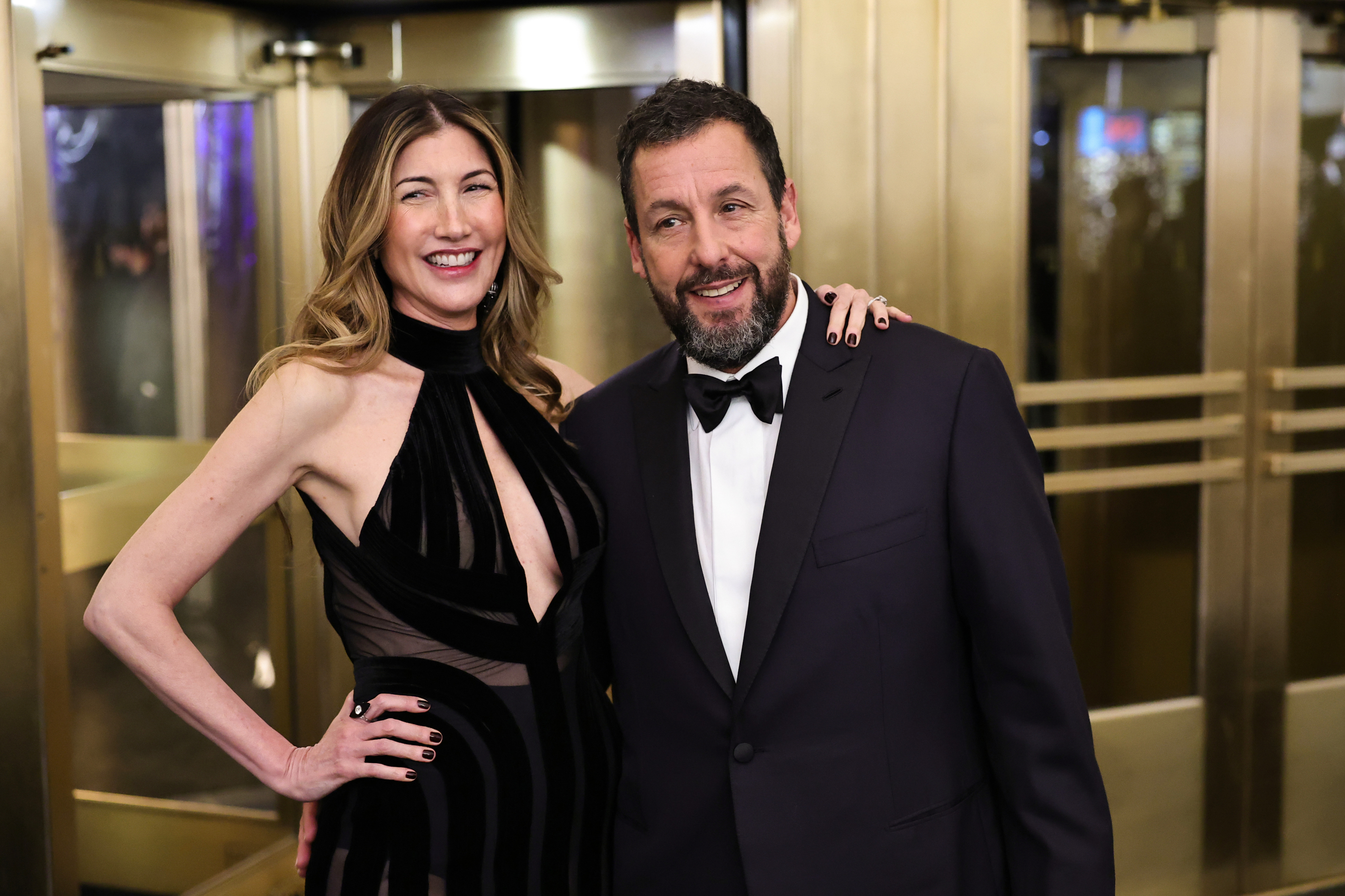 Jackie Sandler and Adam Sandler are pictured at "SNL50: The Anniversary Special" at 30 Rockefeller Plaza on February 16, 2025, in New York | Source: Getty Images