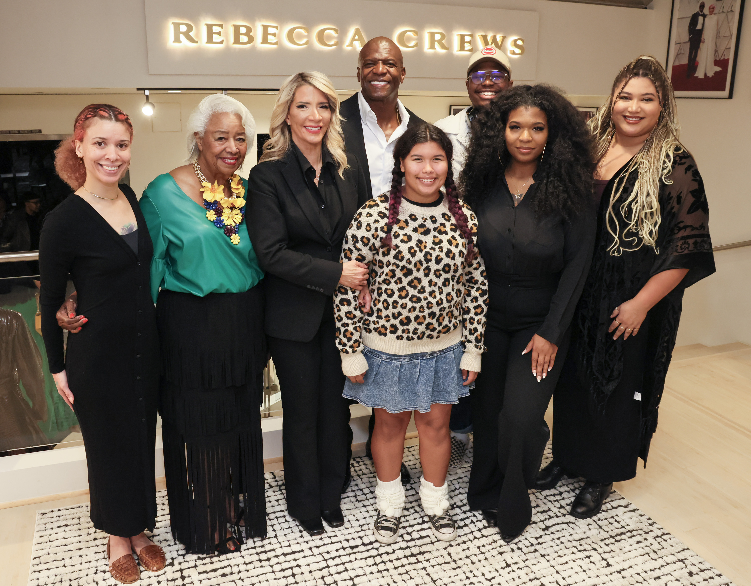 Naomi Burton-Crews, Anna King Lund, Rebecca, Terry, Miley, Isaiah, Tera, and Azriel Crews attend Rebecca Crews Flagship VIP Grand Opening Cocktail Party on October 10, 2024 | Source: Getty Images