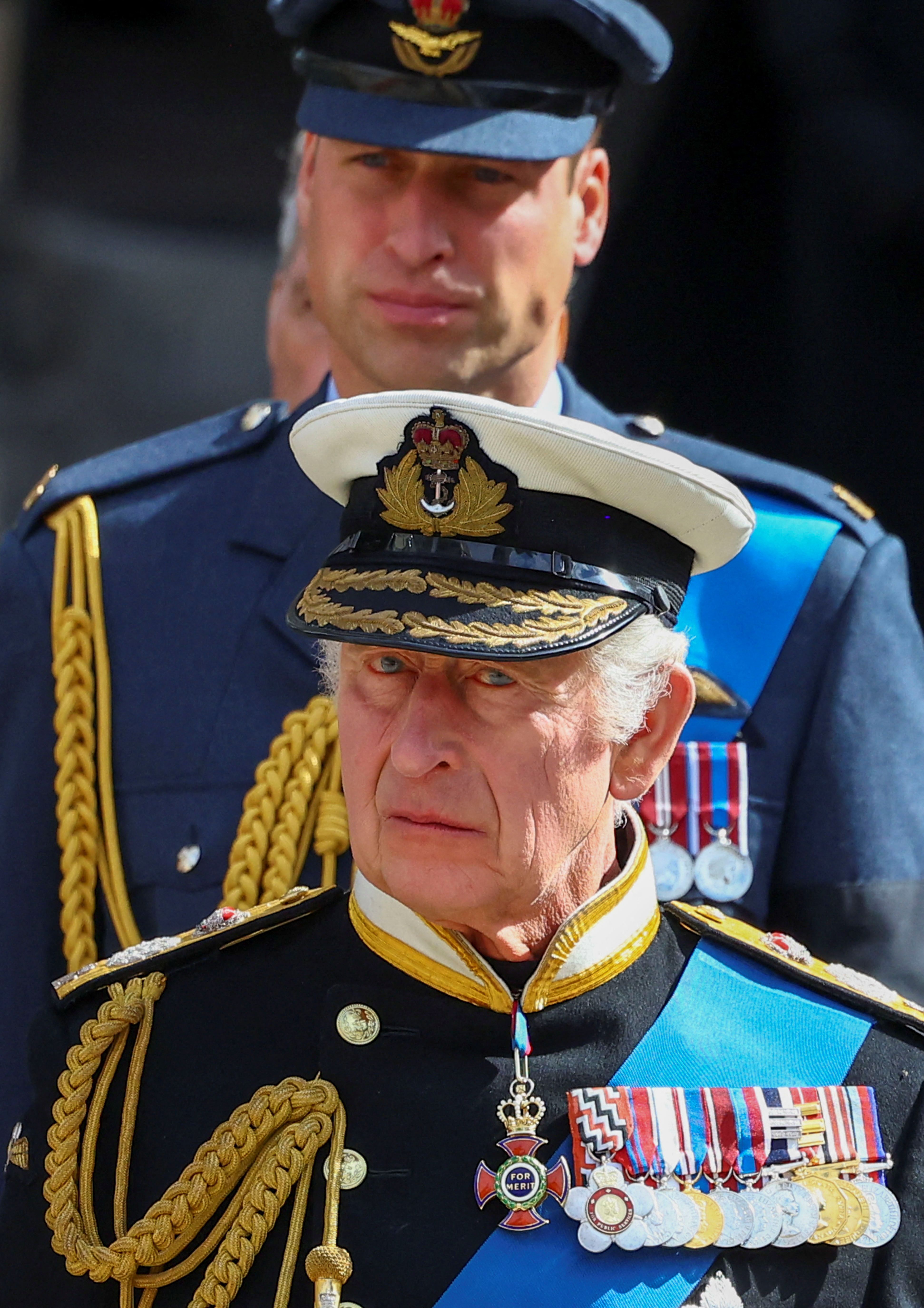 Britain's King Charles III and William, Prince of Wales attend the state funeral and burial of Britain's Queen Elizabeth, in London, Britain, September 19, 2022. | Source: Getty Images