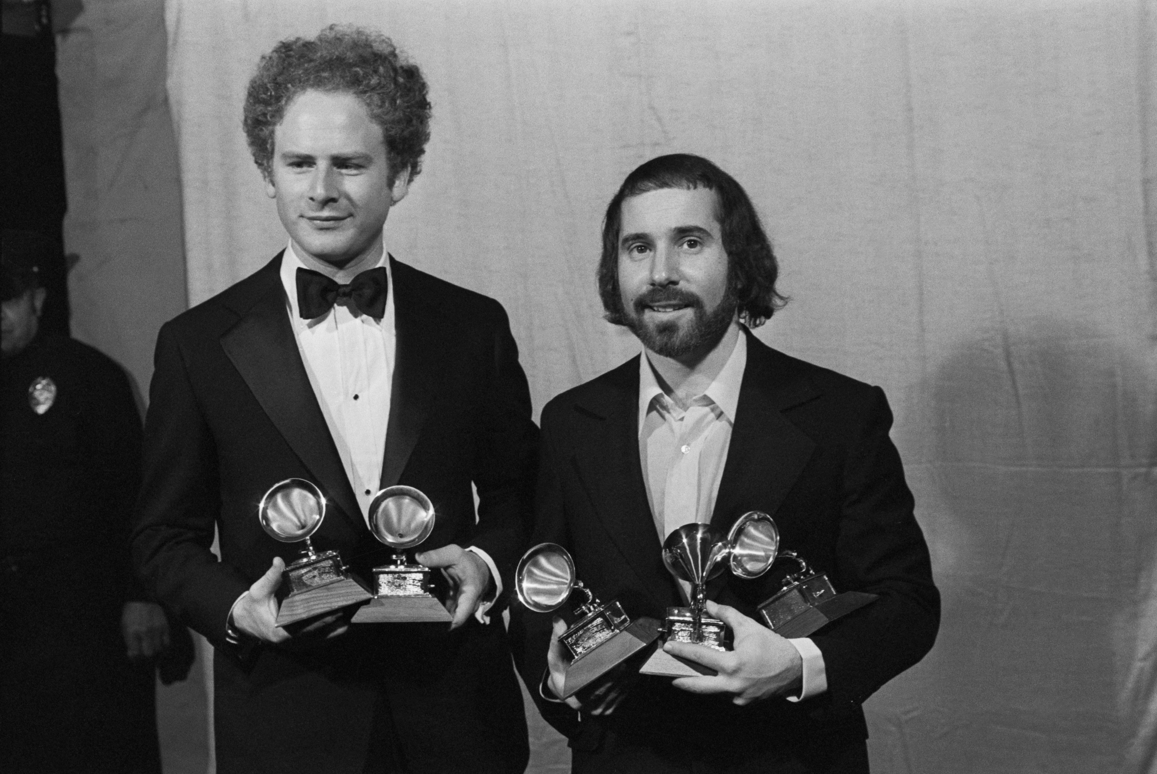 Arthur Garfunkel and Paul Simon hold a "Grammy" for best record and best album of the year for "Bridge Over Troubled Water," in Hollywood California, on May 16, 1971. | Source: Getty Images