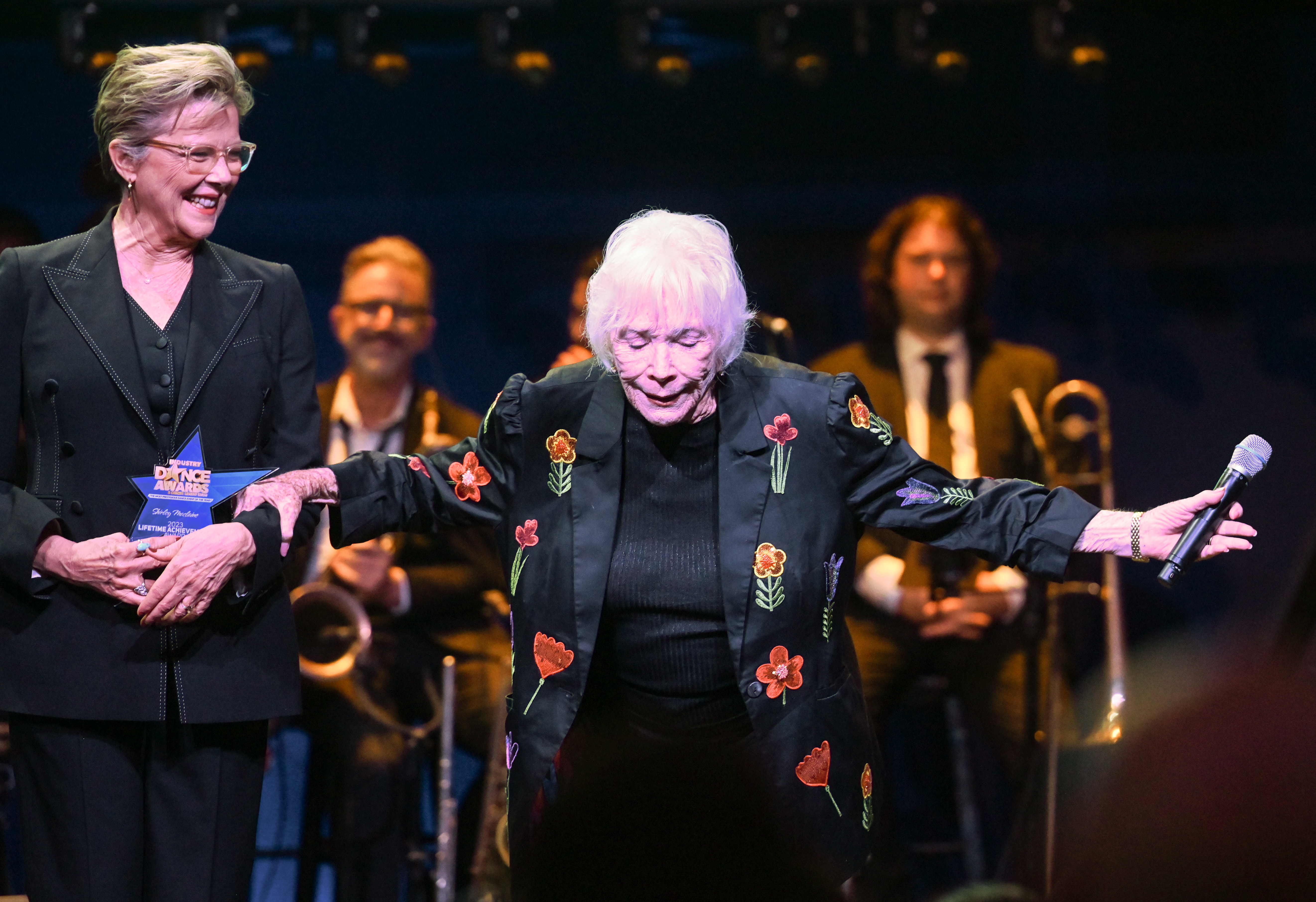 Annette Bening and Shirley MacLaine onstage at the Industry Dance Awards held at Avalon Hollywood on October 18, 2023 in Los Angeles, California | Source: Getty Images