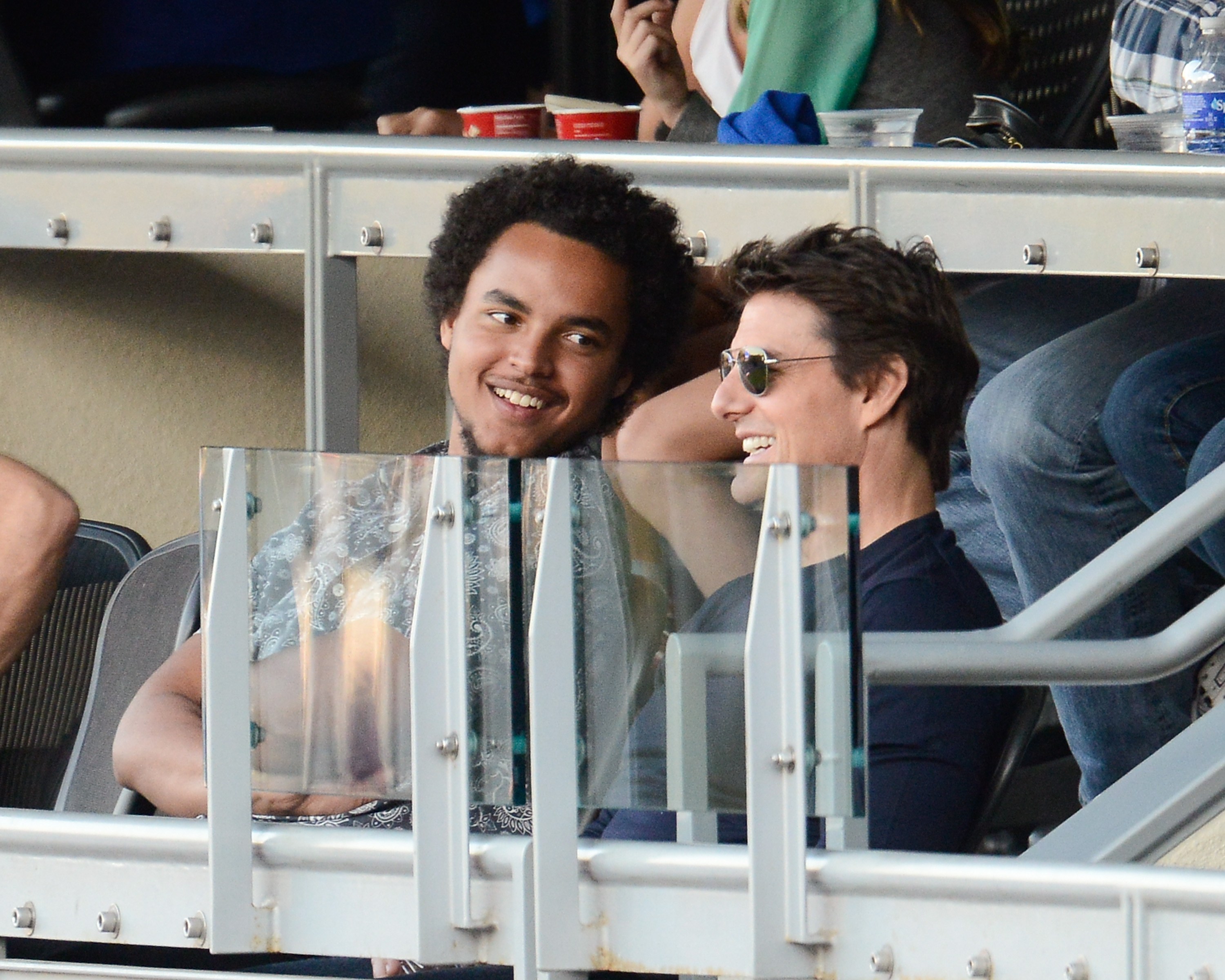 Connor and Tom Cruise at Game Four of the National League Championship Series at Dodger Stadium on October 15, 2013, in Los Angeles, California. | Source: Getty Images