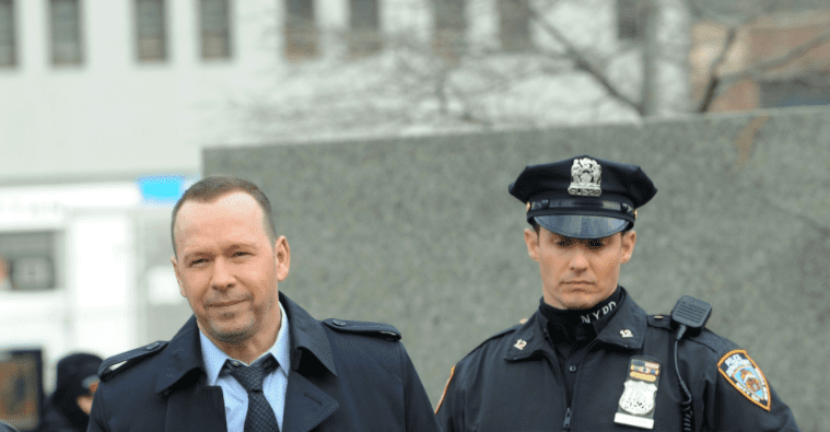 Donnie Wahlberg and Will Estes on the set of "Blue Bloods" on January 14, 2016 in New York City | Photo: Getty Images