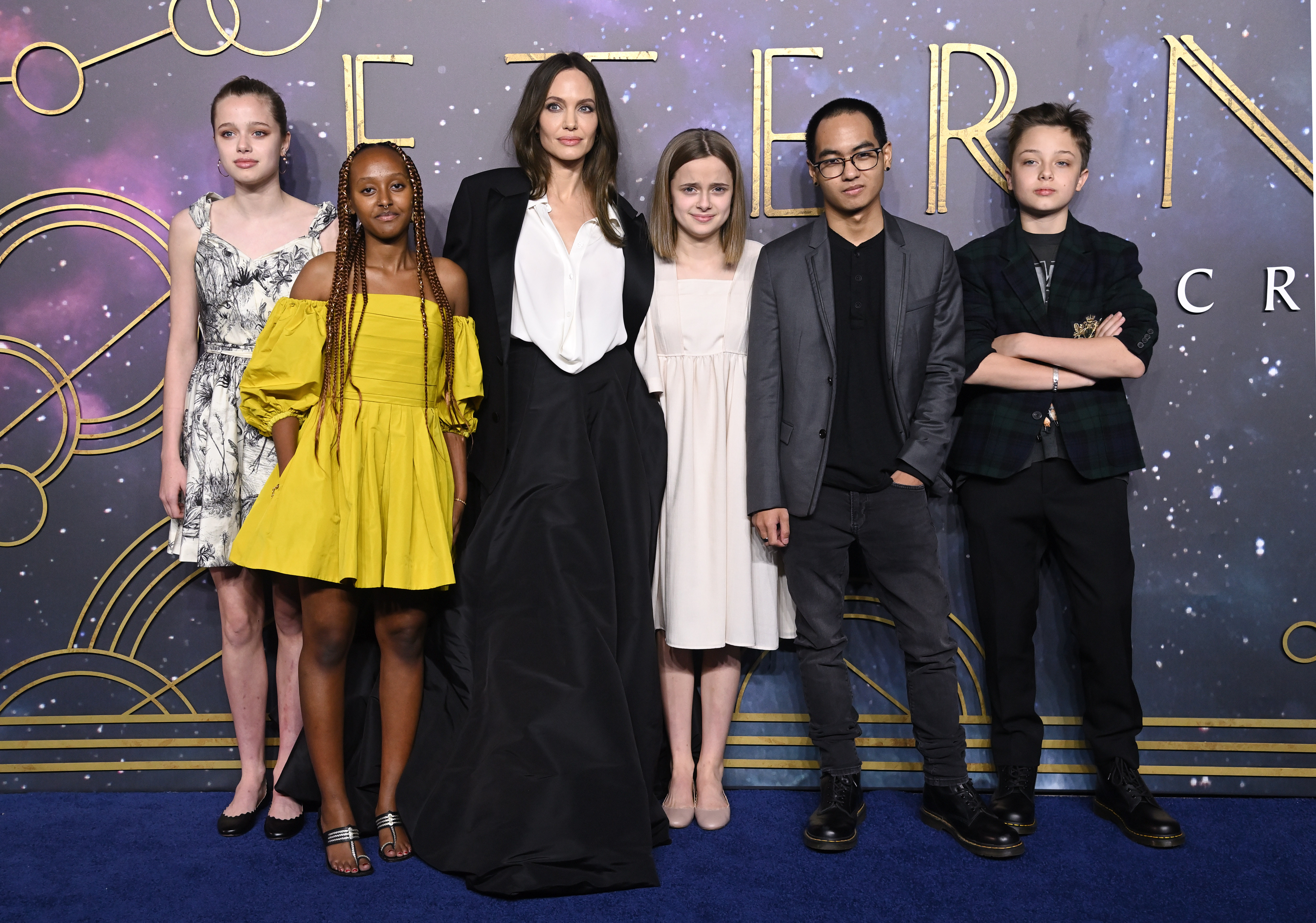 Angelina Jolie with her children  Vivienne, Maddox, Knox, Shiloh, and Zahara in London, in 2021. | Source: Getty Images
