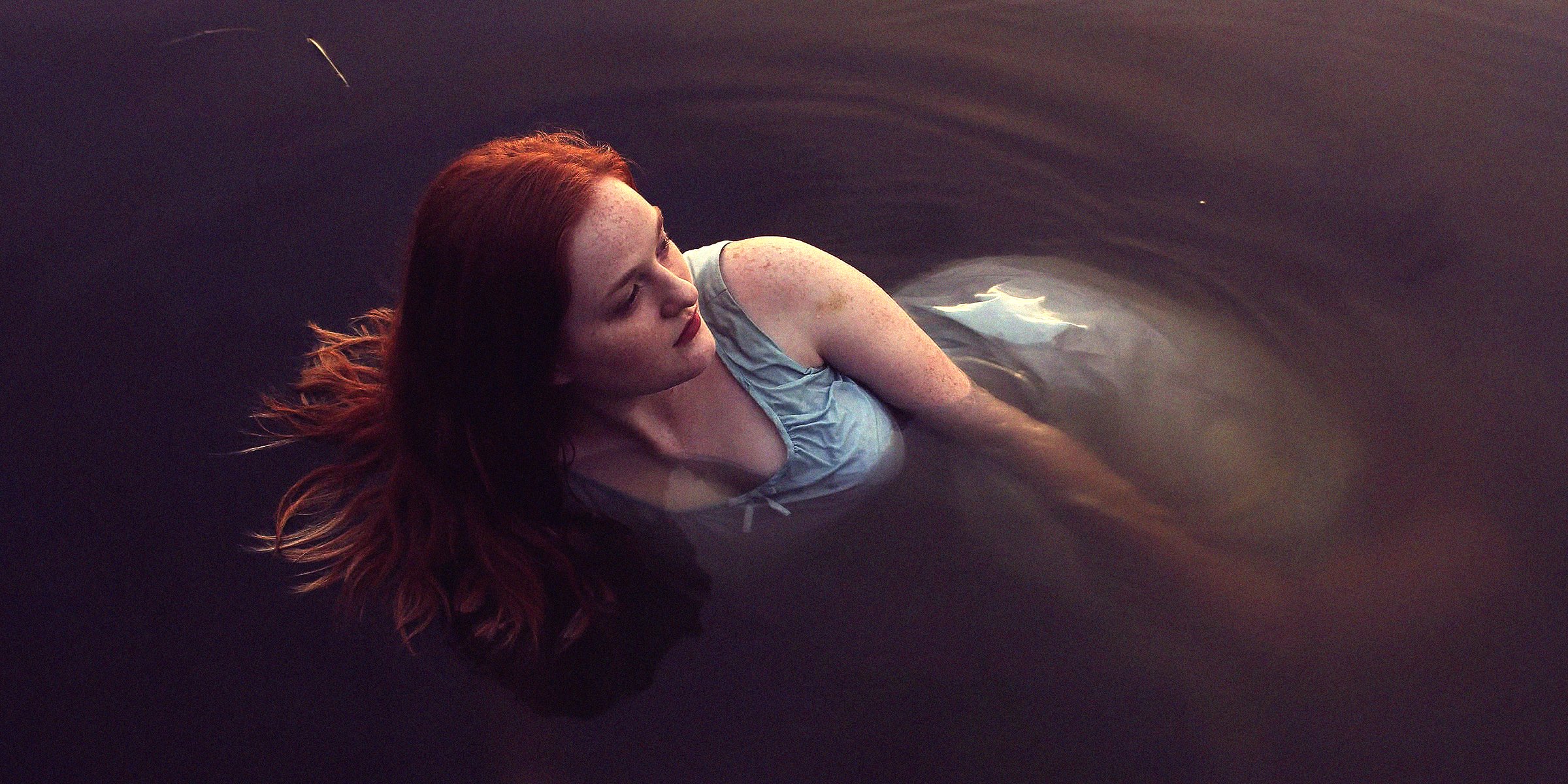 Unsplash | A woman swimming