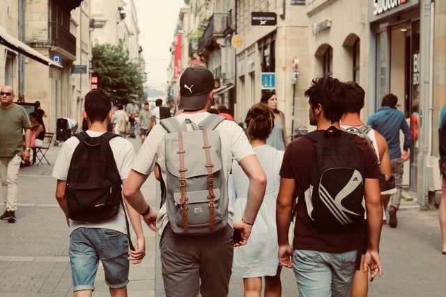 Group of teenagers walking on a street | Source: Unsplash