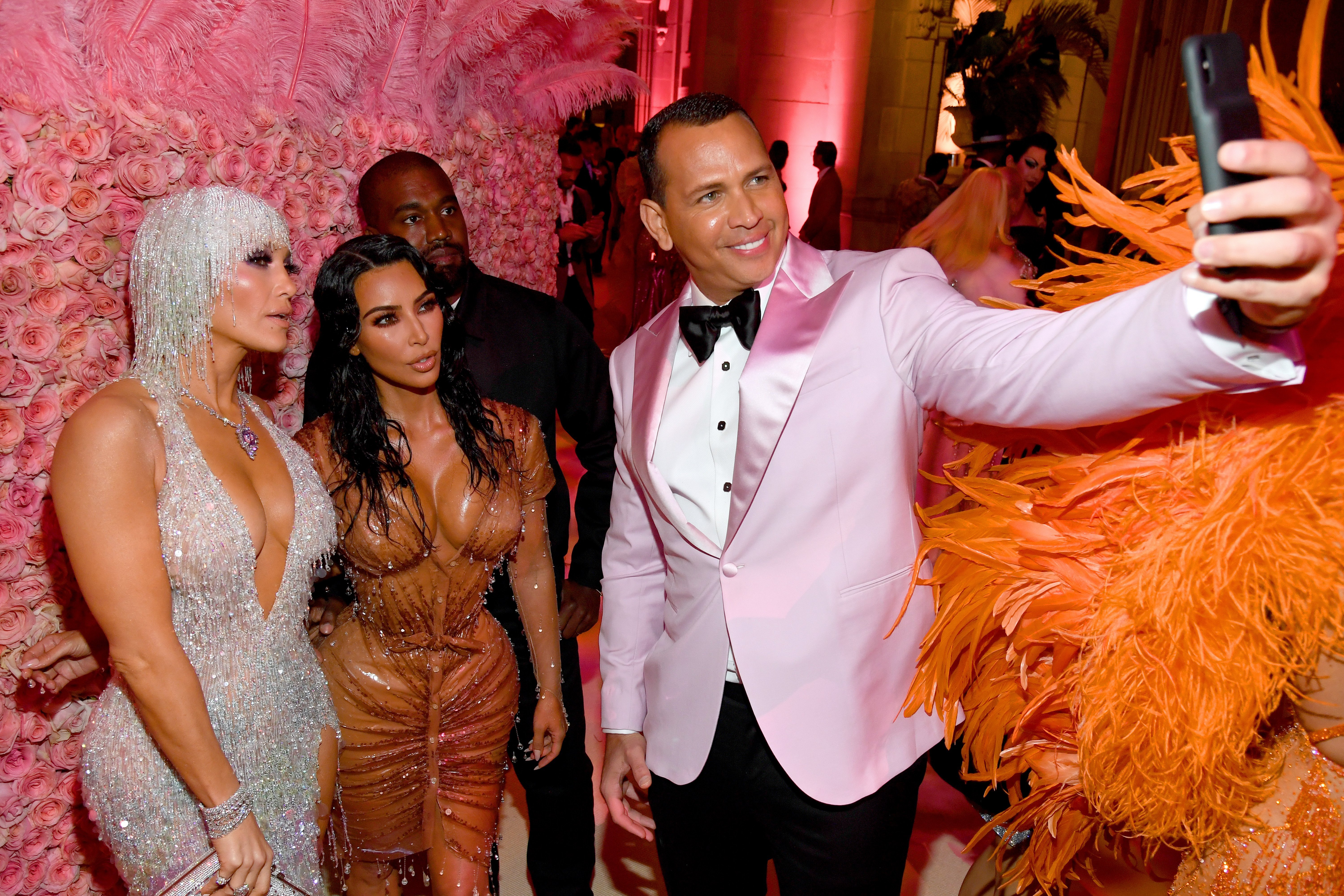 Kim Kardashian and Kanye West posing with Jennifer Lopez and Alex Rodriguez at the 2019 Met Gala | Photo: Getty Images