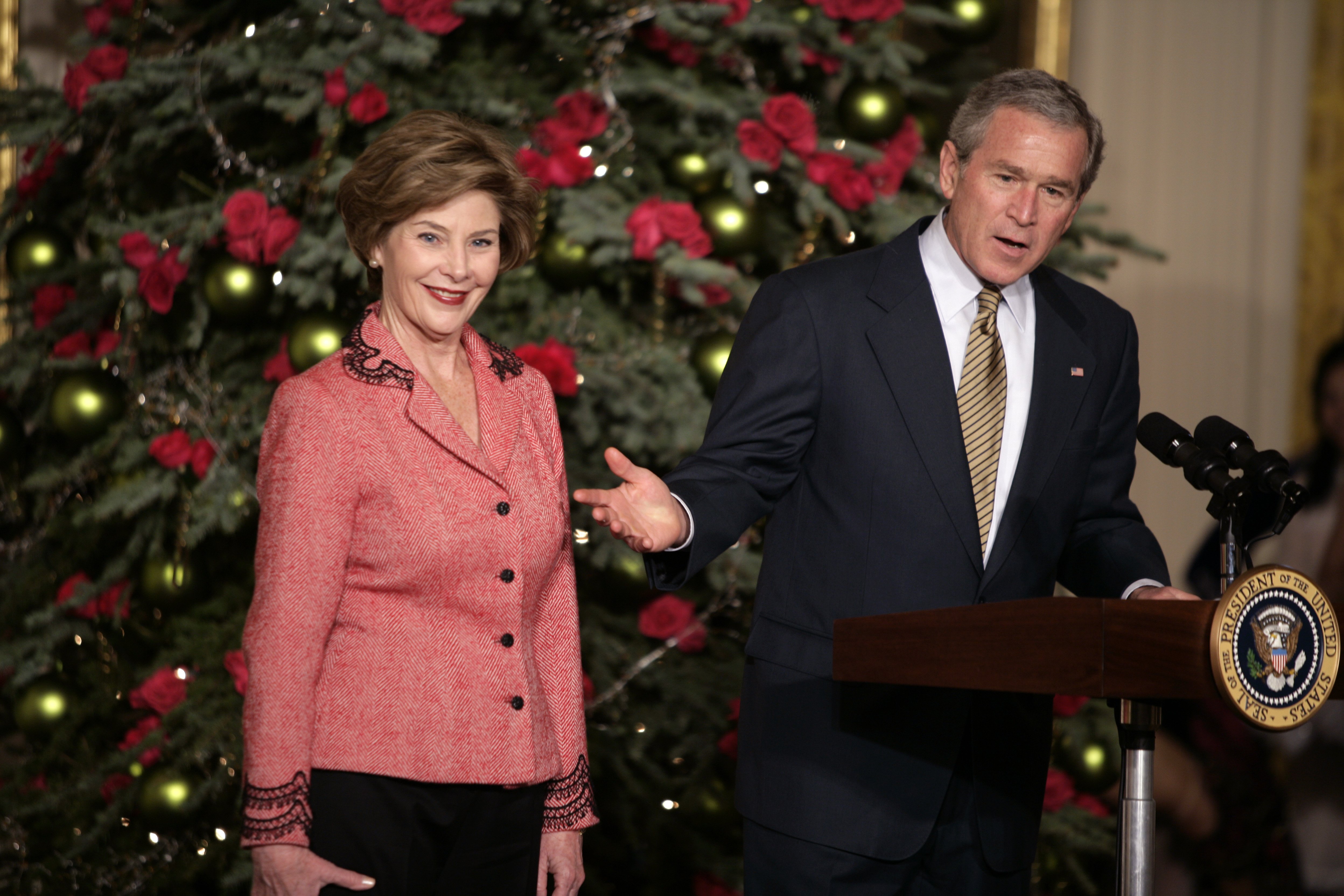 George W. Bush and his wife Laura Bush during their annual children's holiday reception and performance in the East Room of the White House on December 5, 2005. / Source: Getty Imagees