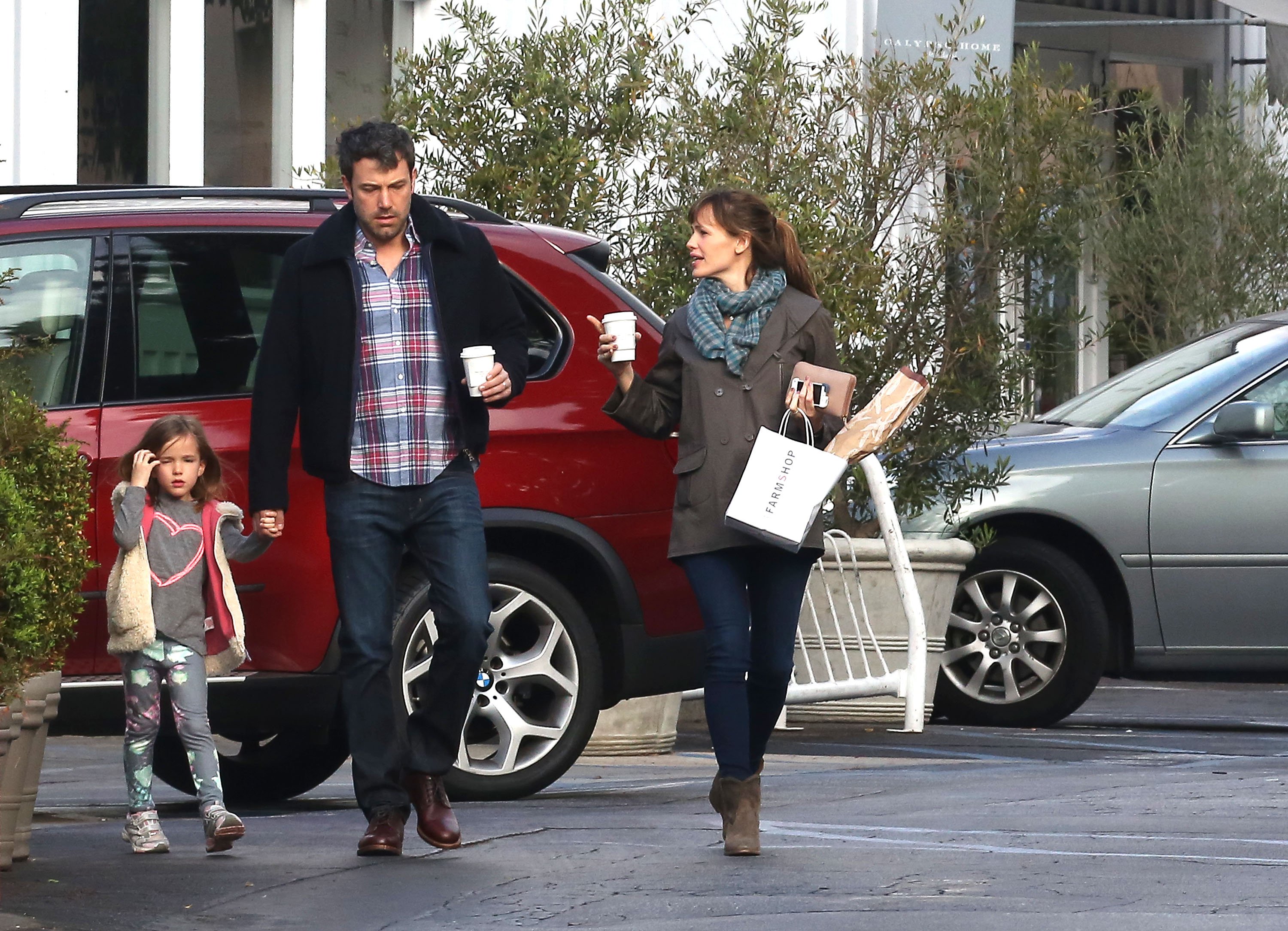 Ben Affleck and Jennifer Garner are seen leaving the Brentwood Country Mart with their daughter, Seraphina Affleck on February 06, 2014 in Los Angeles, California. | Source: Getty Images