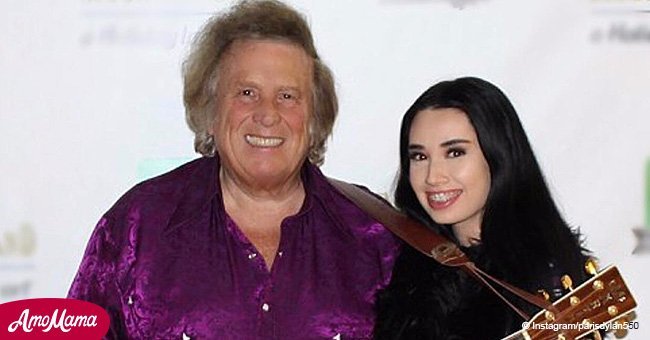 72-year-old country star's young girlfriend exposes her cleavage in eye-catching lingerie