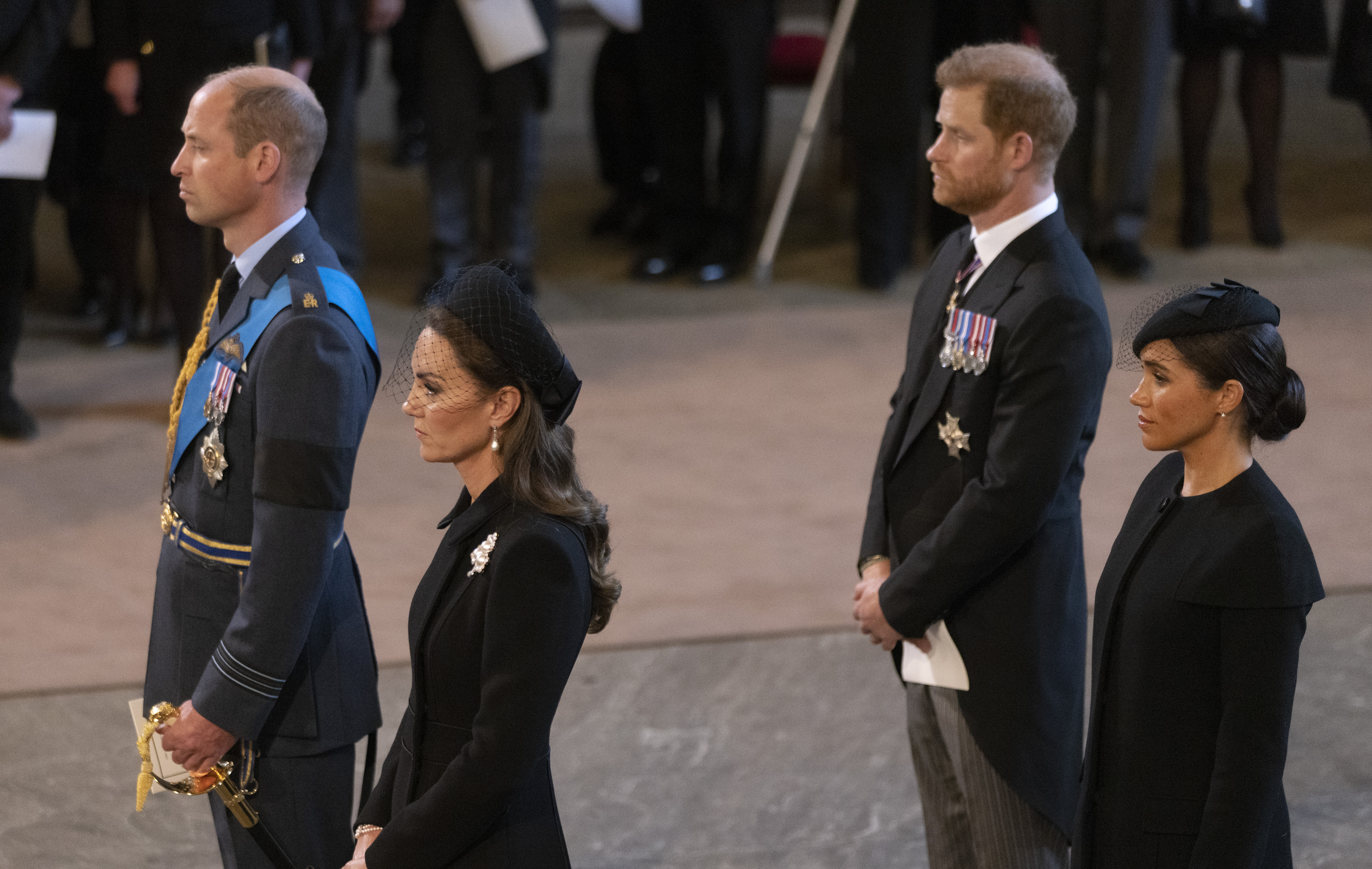 Prince William, Princess of Wales, Prince Harry, and Duchess Meghan arrive as Queen Elizabeth II's body completes its journey from Buckingham Palace to Westminster Hall on September 14, 2022, in London, England | Source: Getty Images