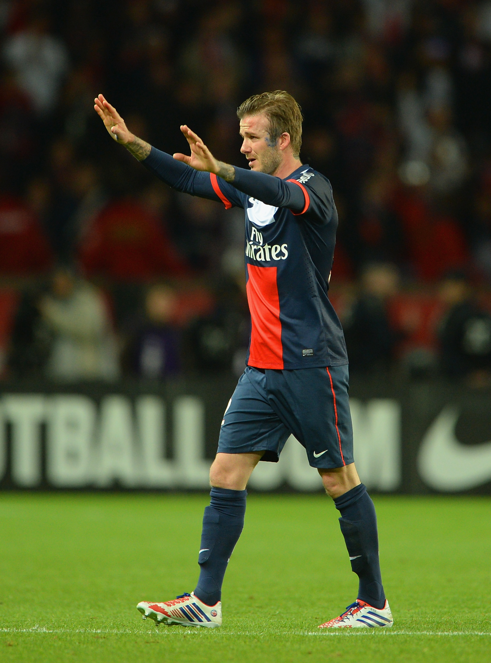 David Beckham waves to the crowd after his final Ligue 1 match on May 18, 2013 in Paris, France. | Source: Getty Images