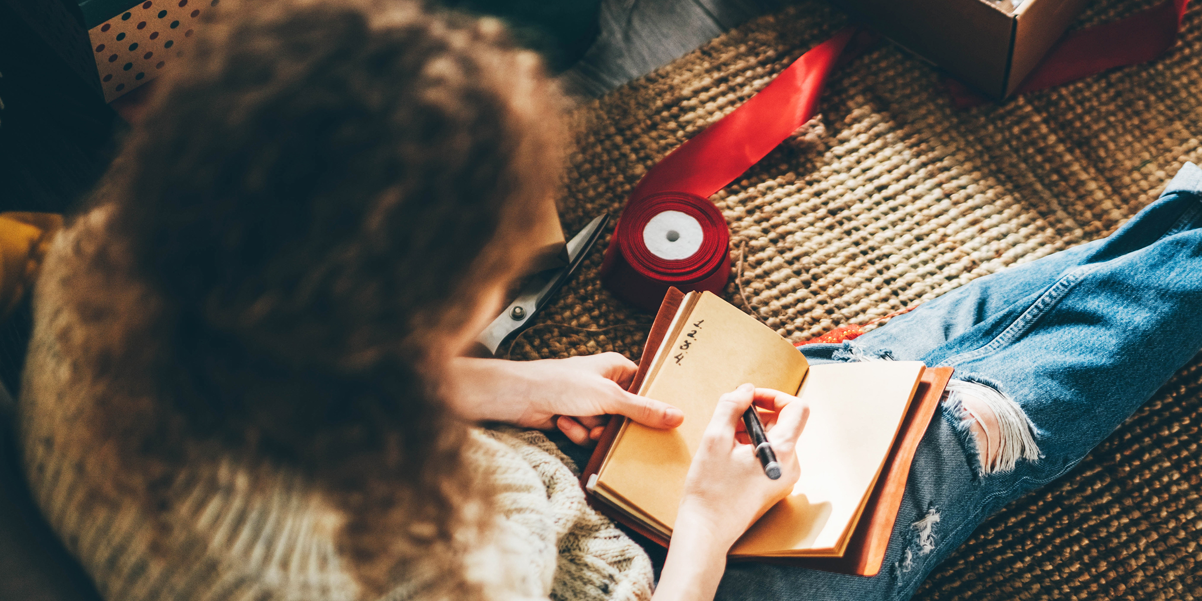 A woman making a list | Source: Shutterstock