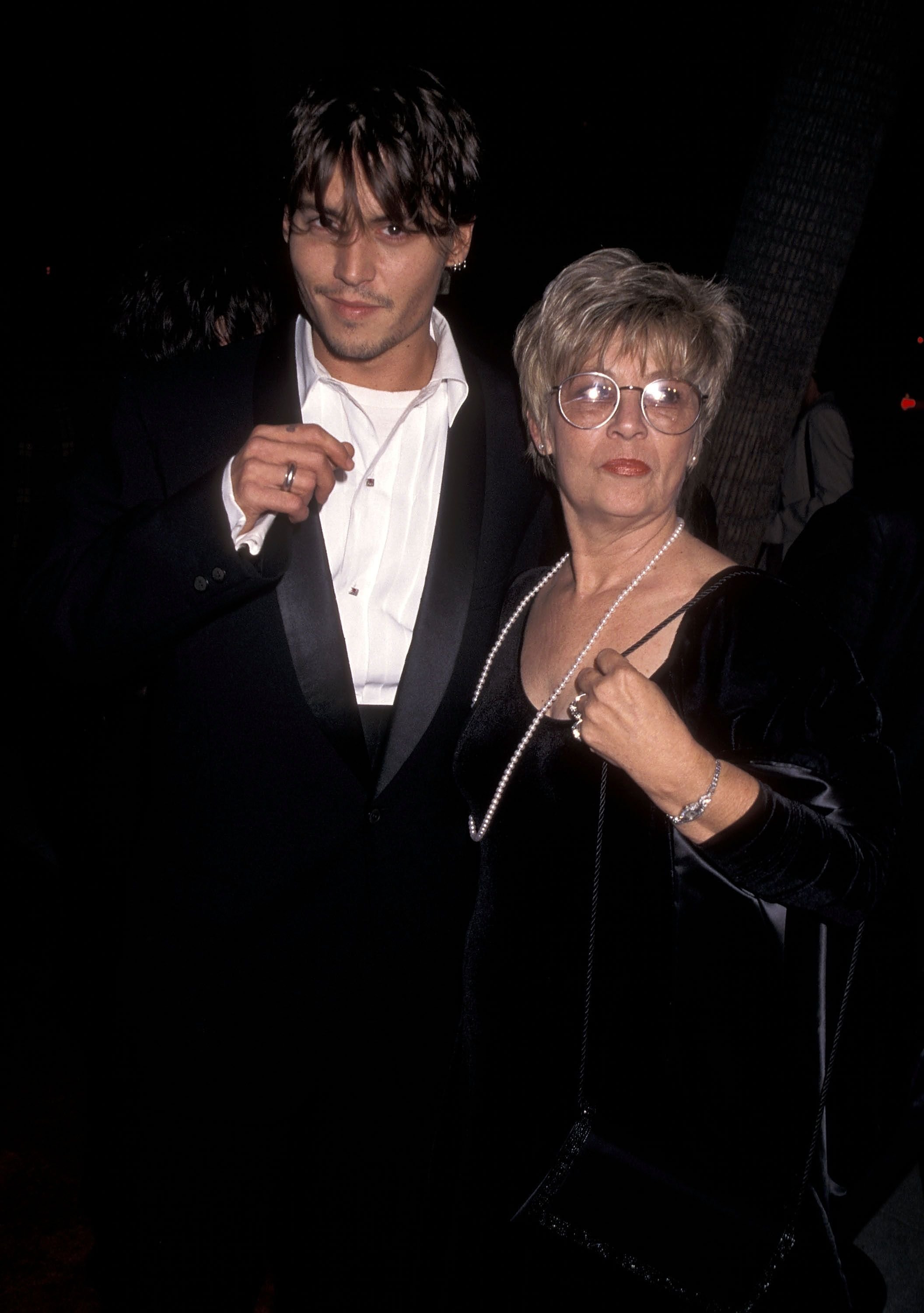 Johnny Depp and mother Betty Sue Wells at the "Nick of Time" Beverly Hills Premiere in 1995 | Source: Getty Images