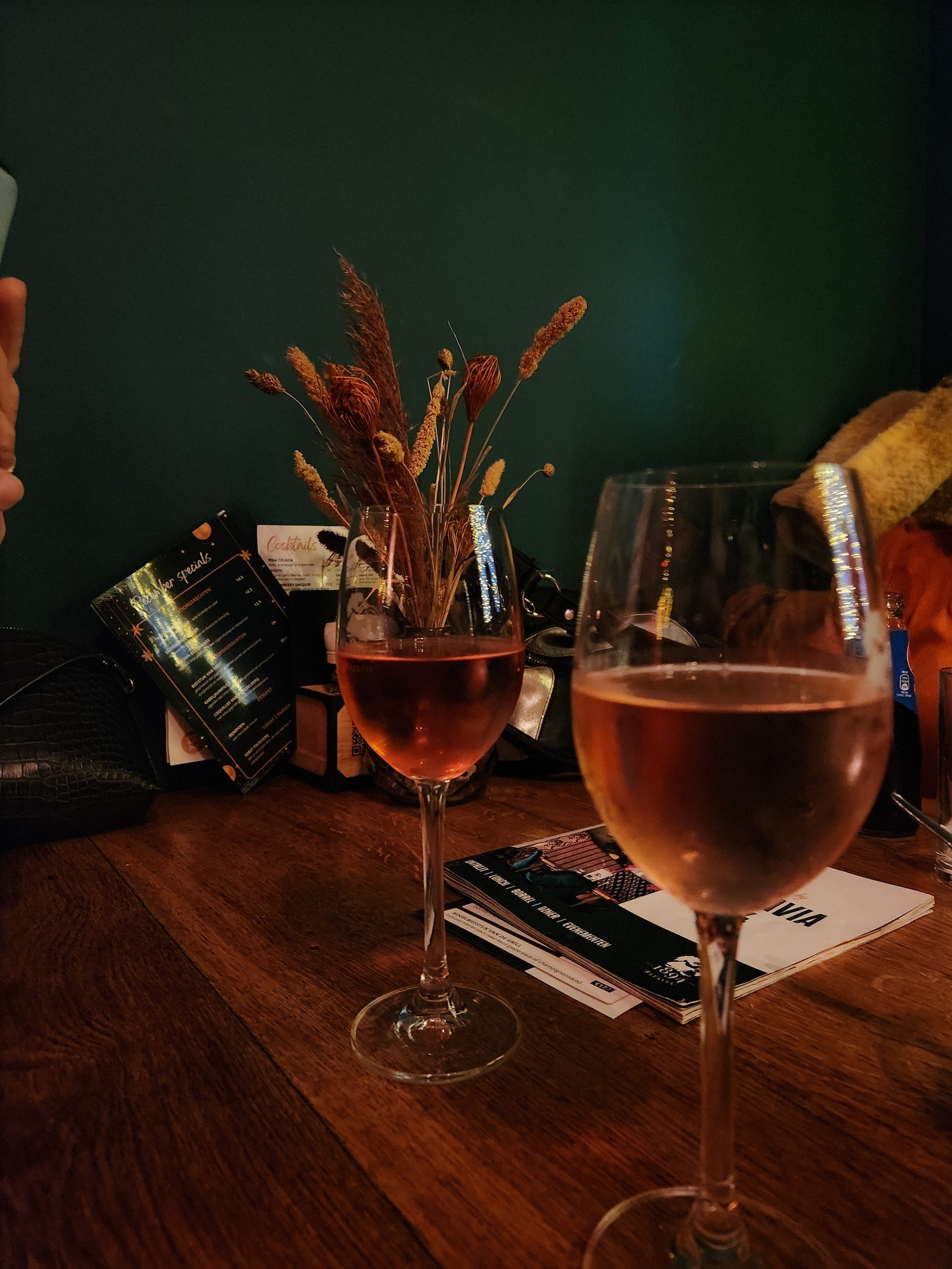 Glasses of wine on table | Source: Pexels