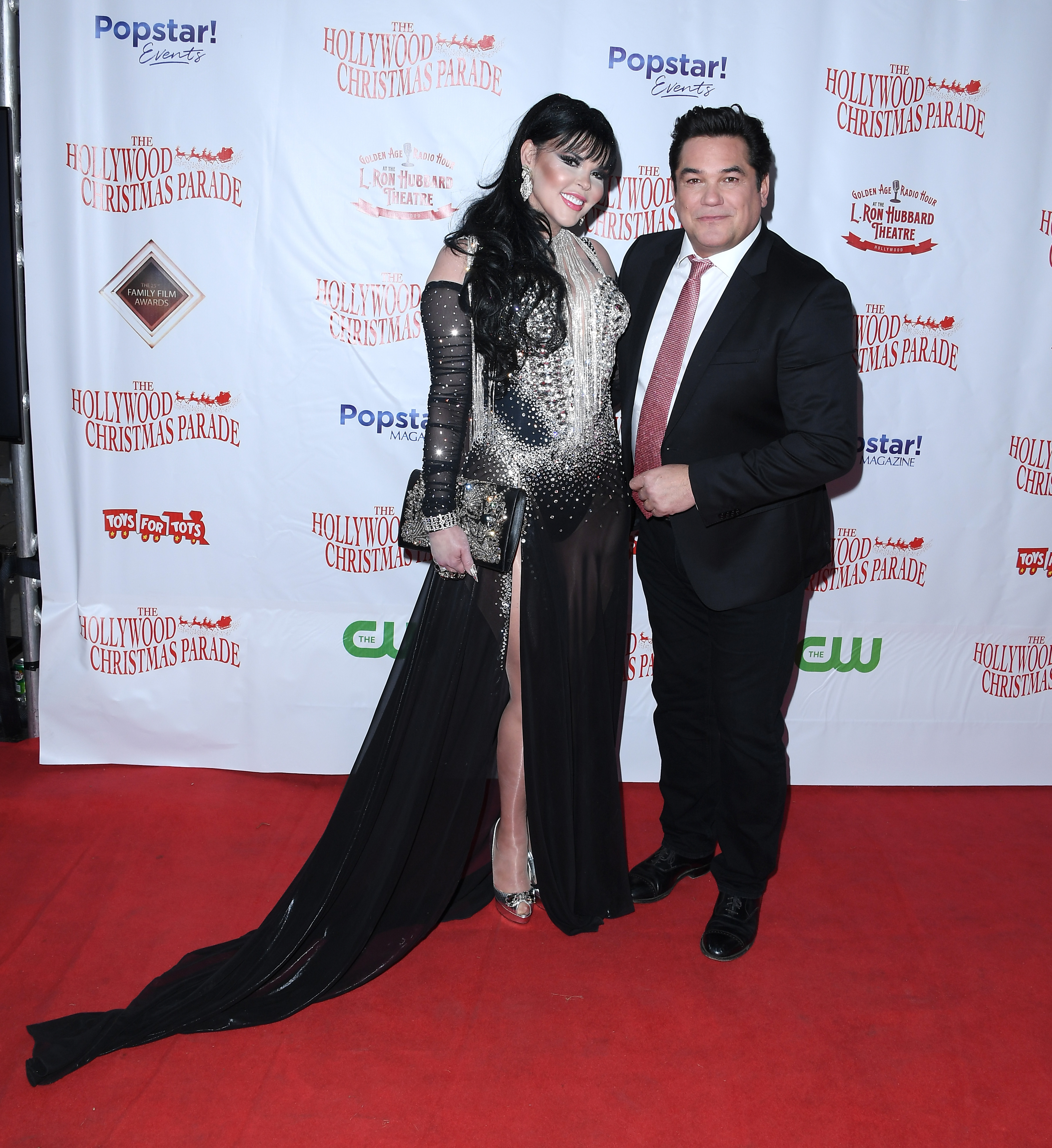 Anna Azerli and Dean Cain attend the 91st anniversary of the Hollywood Christmas Parade, supporting Marine Toys For Tots in Hollywood, California, on November 26, 2023. | Source: Getty Images
