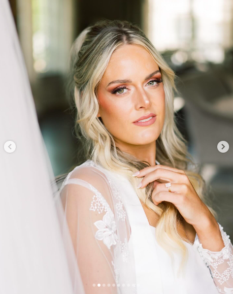 Victoria Schultz posing for a picture on her wedding day, posted on July 26, 2024 | Source: Instagram/antpagephoto and alenkafilms