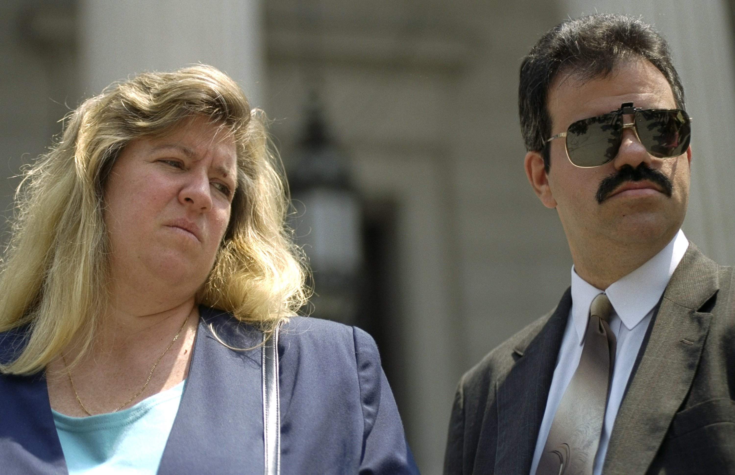 Donna Fasano and her husband Richard leave court proceedings regarding their twin boys. | Source: Getty Images