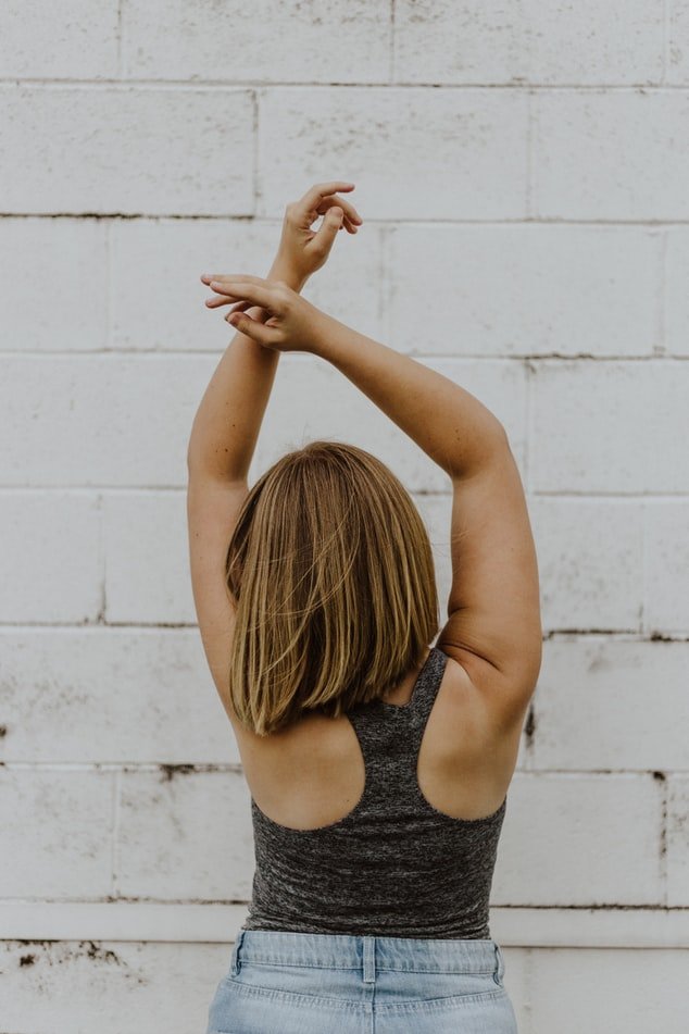 Une femme de dos. l Source : Unsplash