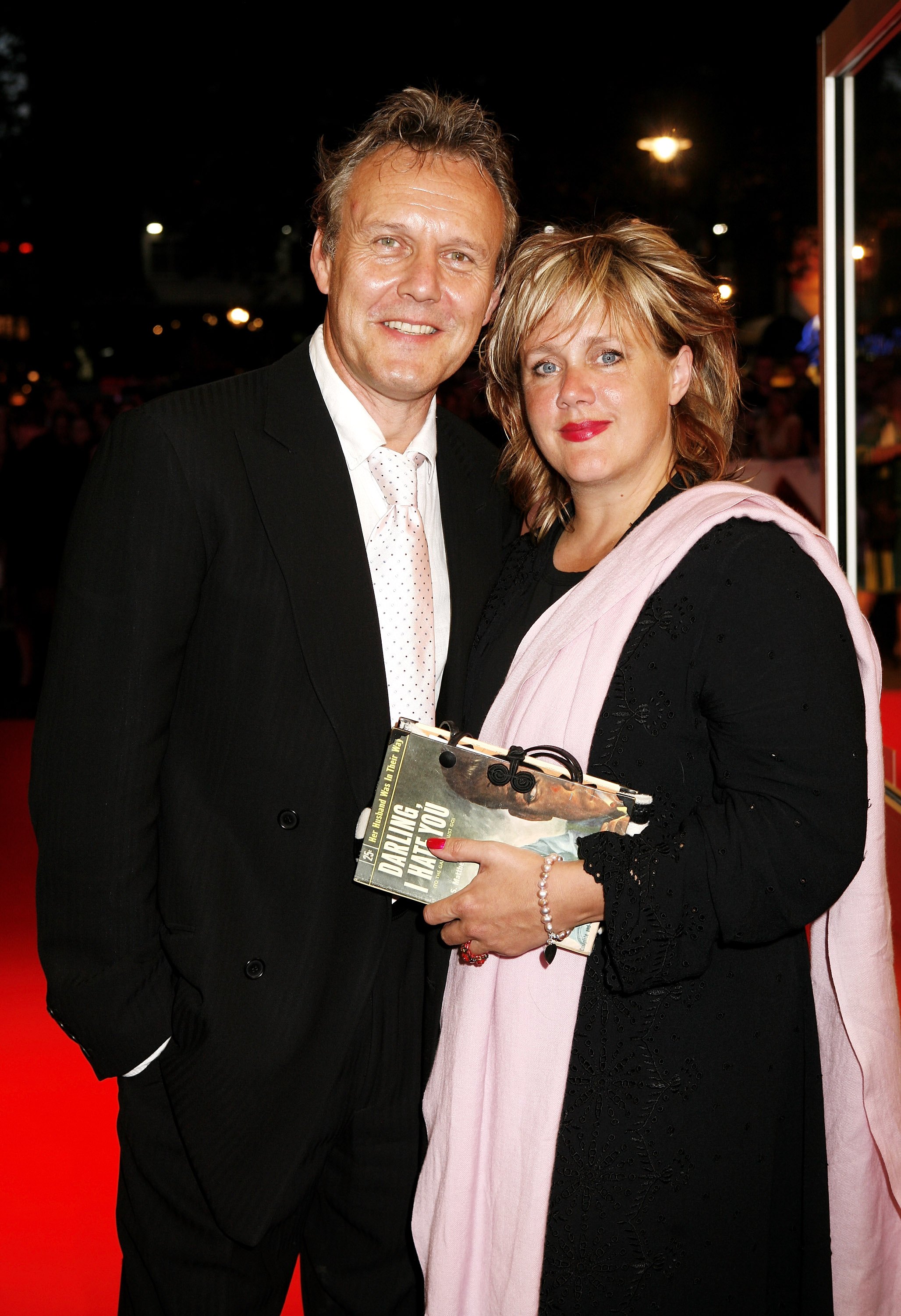 Anthony Head and Sarah Fisher attend the charity gala screening of "The Devil Wears Prada" at the Odeon West End in London, England, on September 21, 2006. | Source: Getty Images