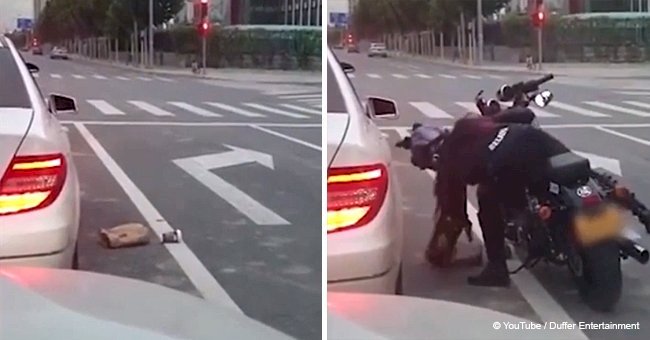 Motorcyclist returns ejected bag of rubbish through driver's window 