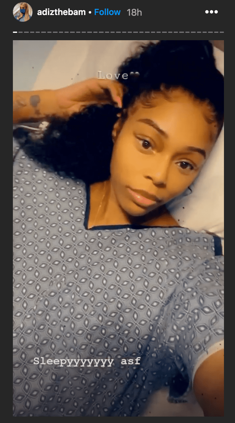 Bambi Benson from "Love & Hip Hip" lays on a hospital bed during labor before the birth of her daughter, Xylo Richardson | Source: Instagram.com/reallilscrappy