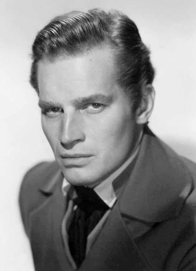 Publicity photo of Charlton Heston for film The President's Lady. c. 1953 | Source: Wikimedia Commons