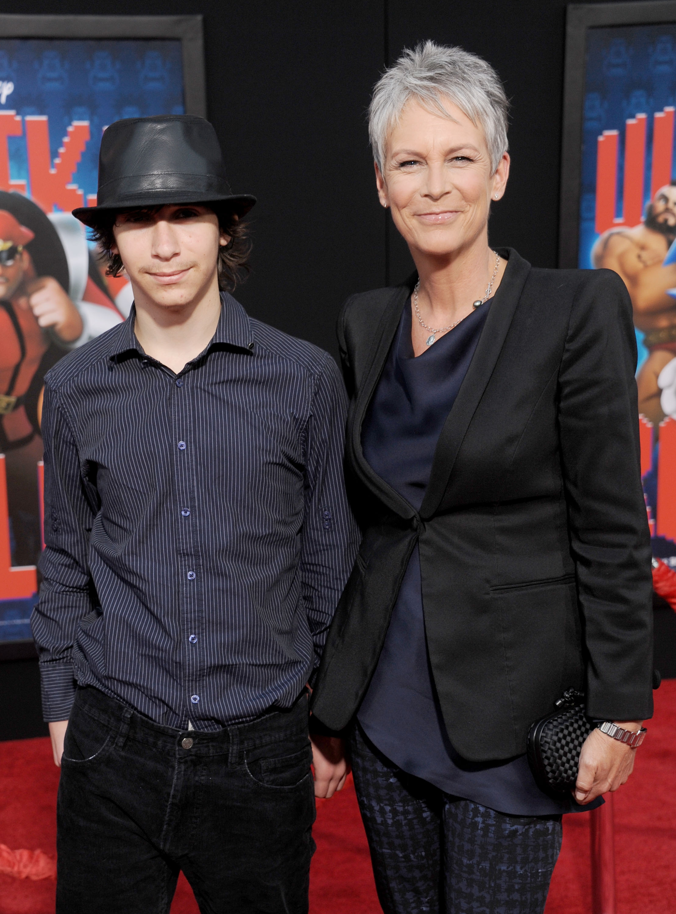 Jamie Lee Curtis and son, before he transitioned, arrive at the Los Angeles premiere of "Wreck-It Ralph" at the El Capitan Theatre on October 29, 2012, in Hollywood, California | Source: Getty Images
