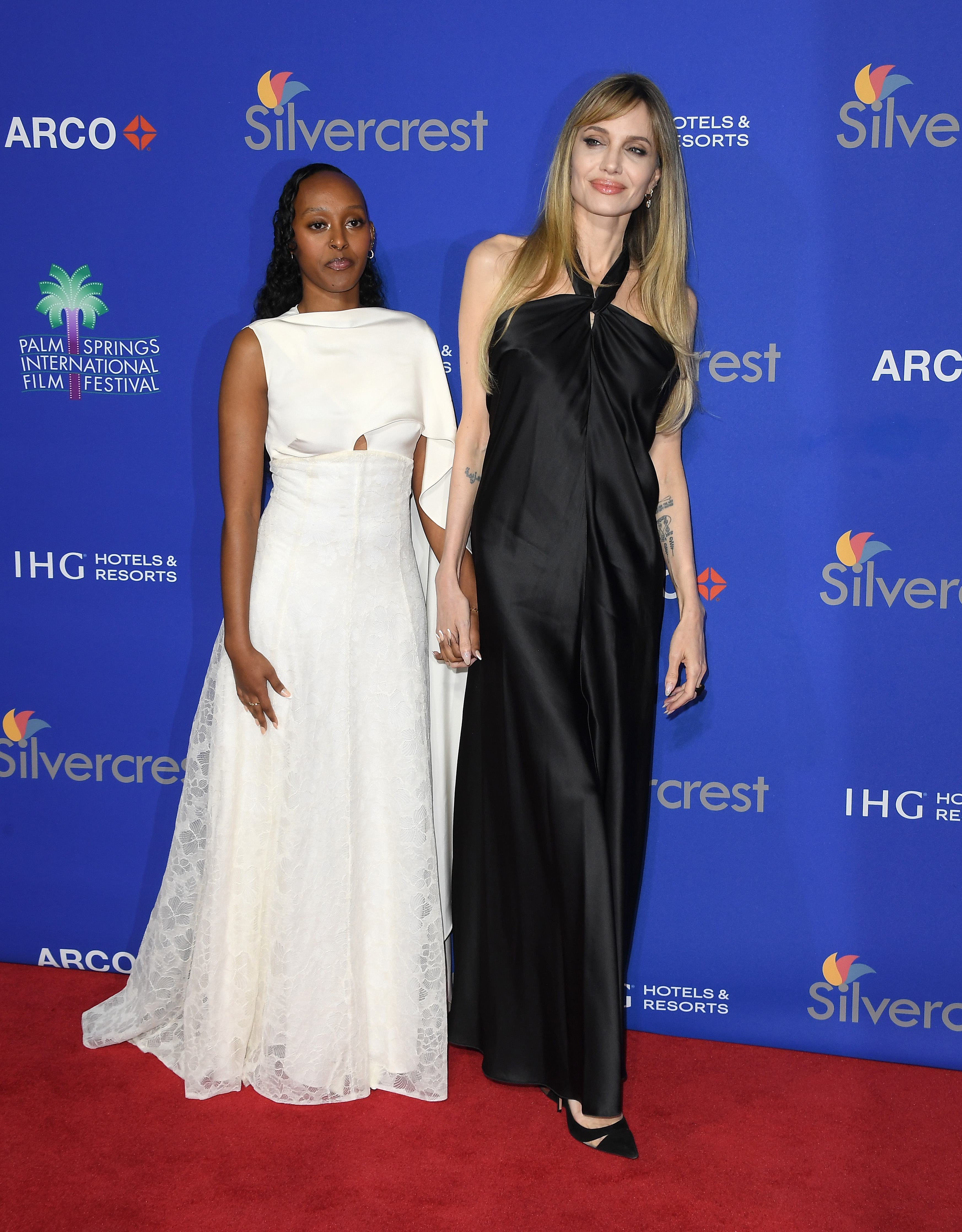 Zahara Marley Jolie,  and Angelina Jolie at the 36th Annual Palm Springs International Film Festival Film Awards on January 03, 2025, in Palm Springs, California. | Source: Getty Images