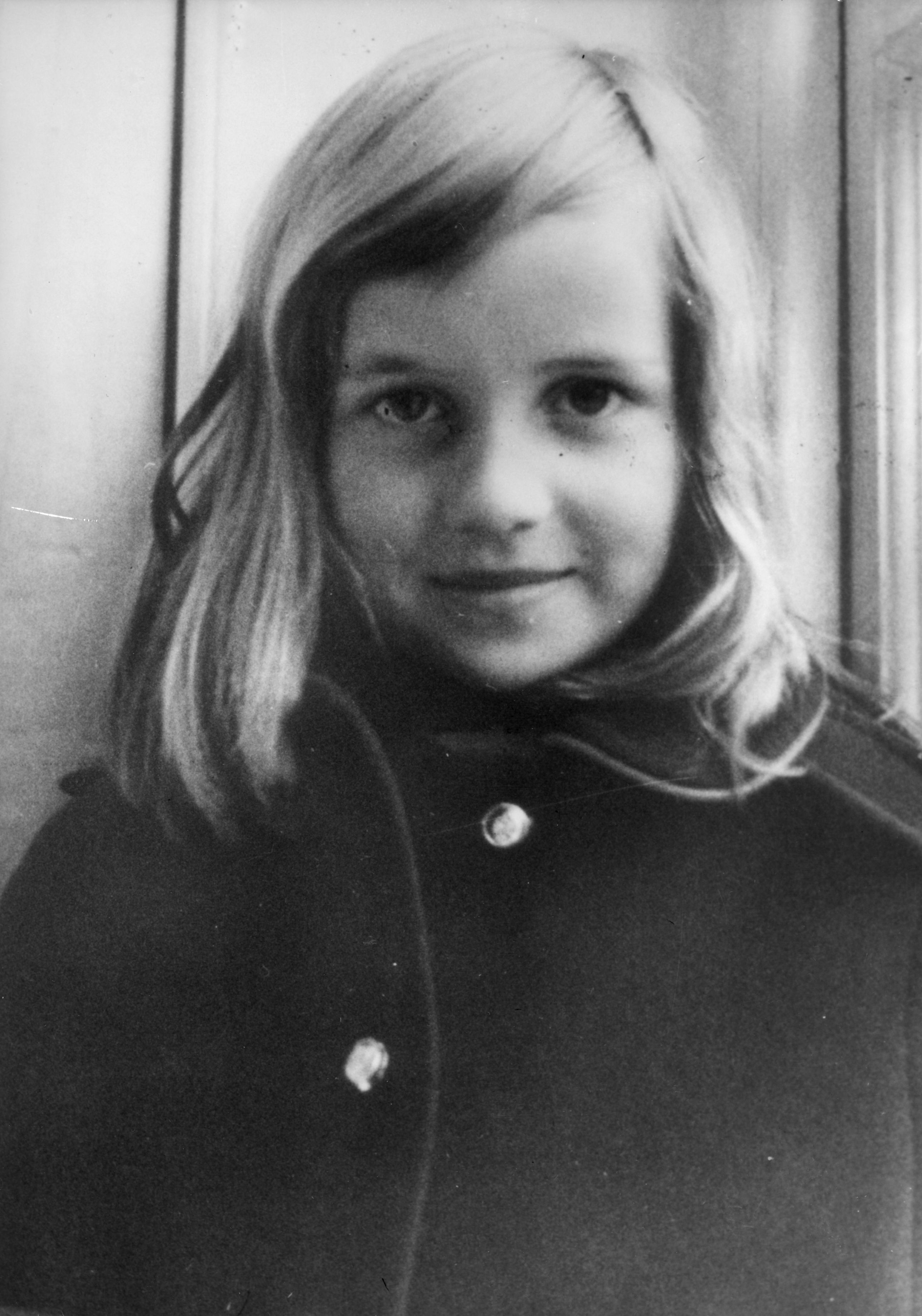A black and white photograph of a young Lady Diana Spencer pictured in 1965. / Source: Getty Images