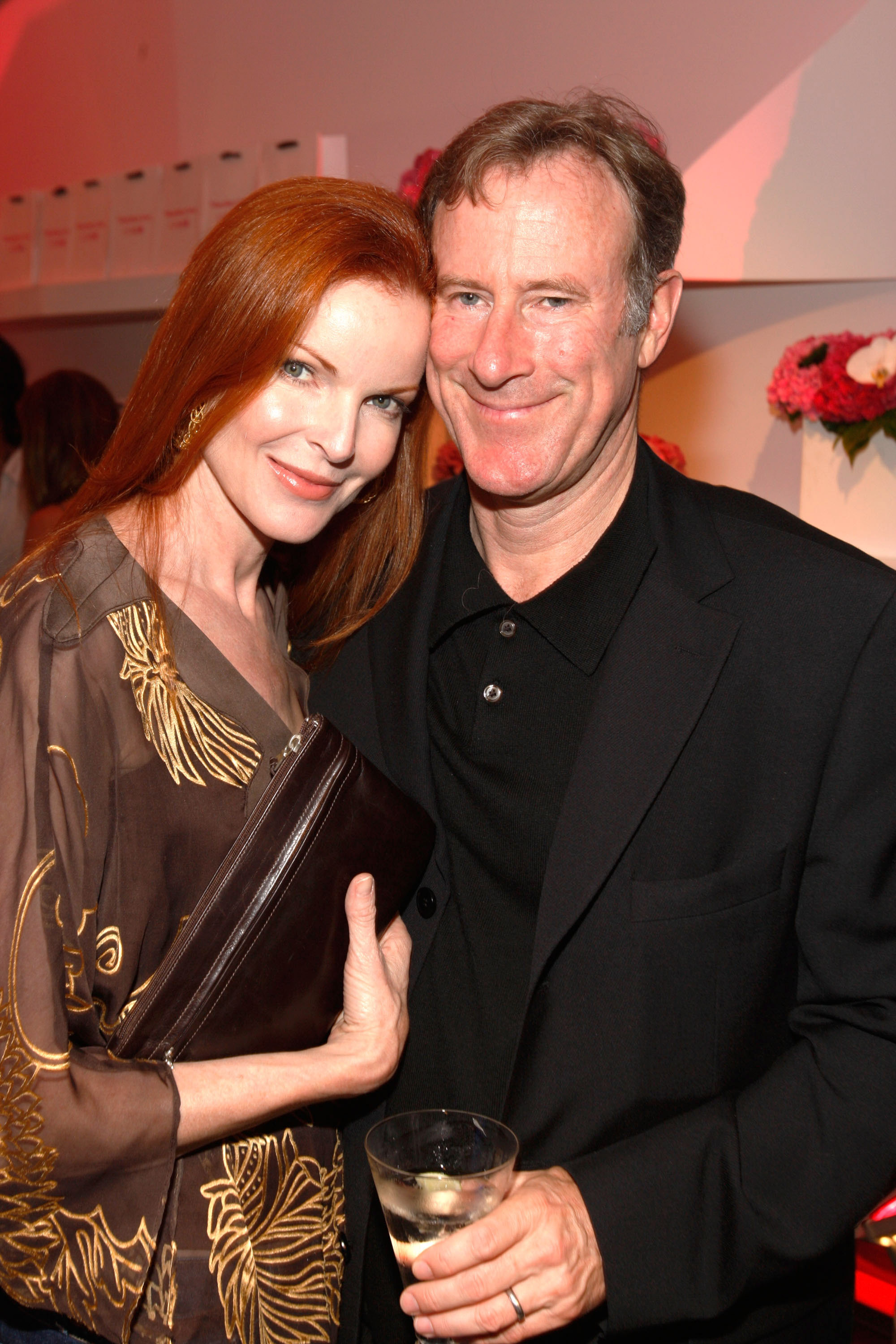 Marcia Cross and Tom Mahoney at the launch party for the BlackBerry 8330 Pink Curve on August 27, 2008, in Los Angeles, California. | Source: Getty Images