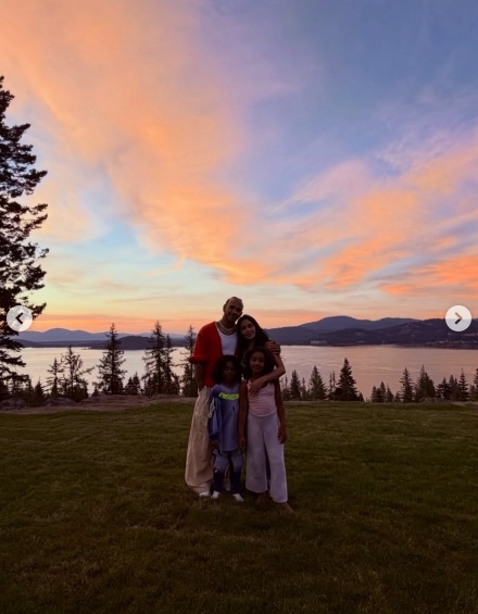 Lewis Hamilton and Kim Kardashian pose with two of Kardashian's children from a post dated July 16, 2026. | Source: Instagram/lewishamilton