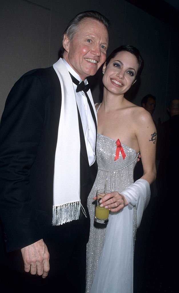 Jon Voight and Angelina Jolie at the 55th Annual Golden Globe Awards | Photo: Getty Images