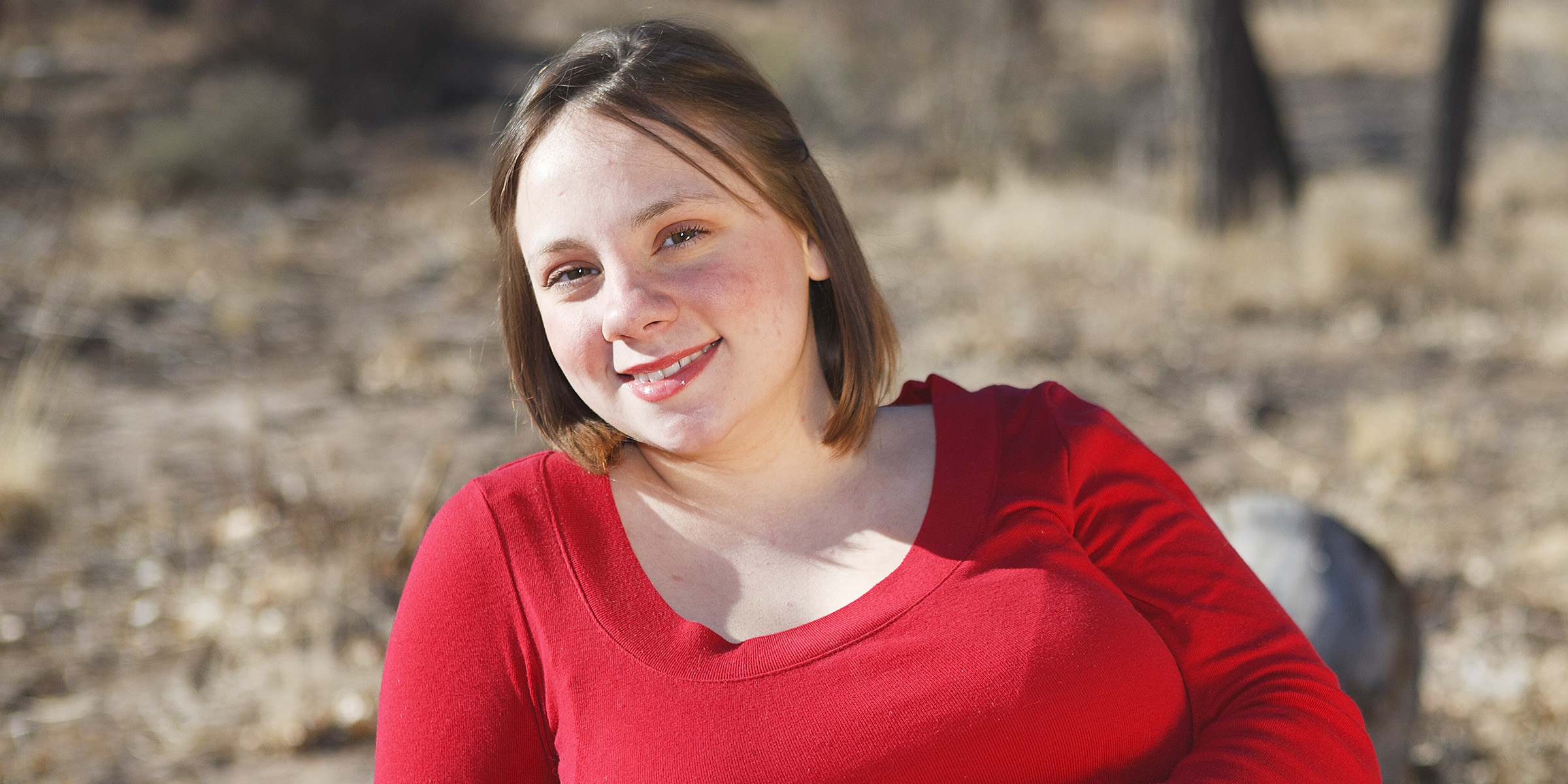 A smiling pregnant woman | Source: Shutterstock