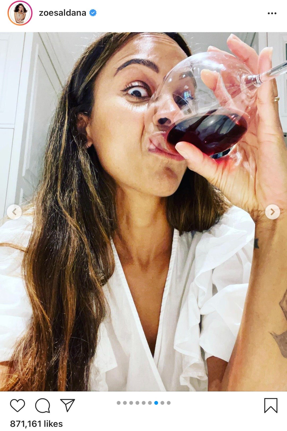 Zoe Saldana drinking wine while showing off a funny expression. | Photo: instagram.com/zoesaldana