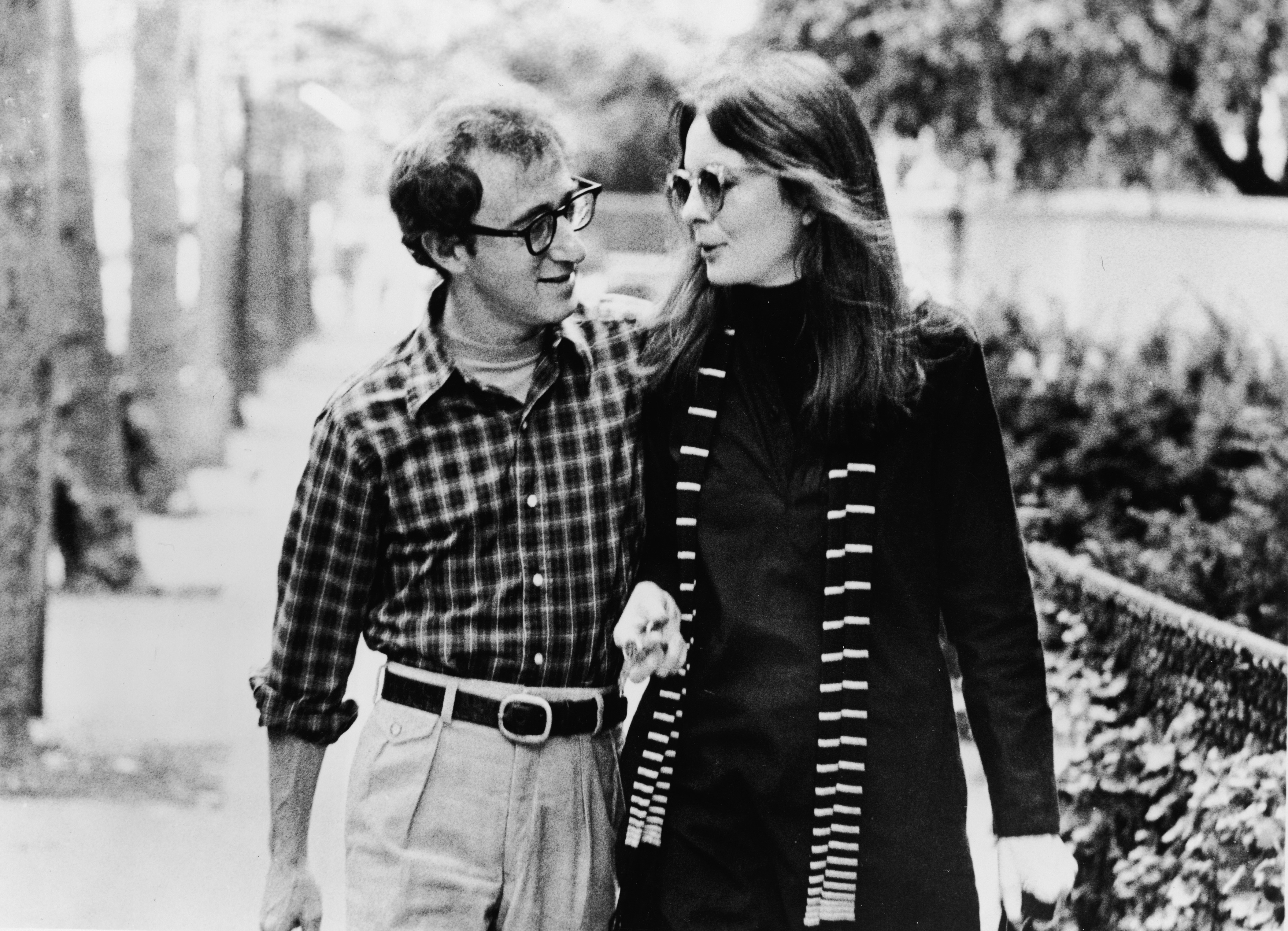 Woody Allen and Diane Keaton walk along a street and talk in a scene from "Annie Hall," in 1977 | Source: Getty Images
