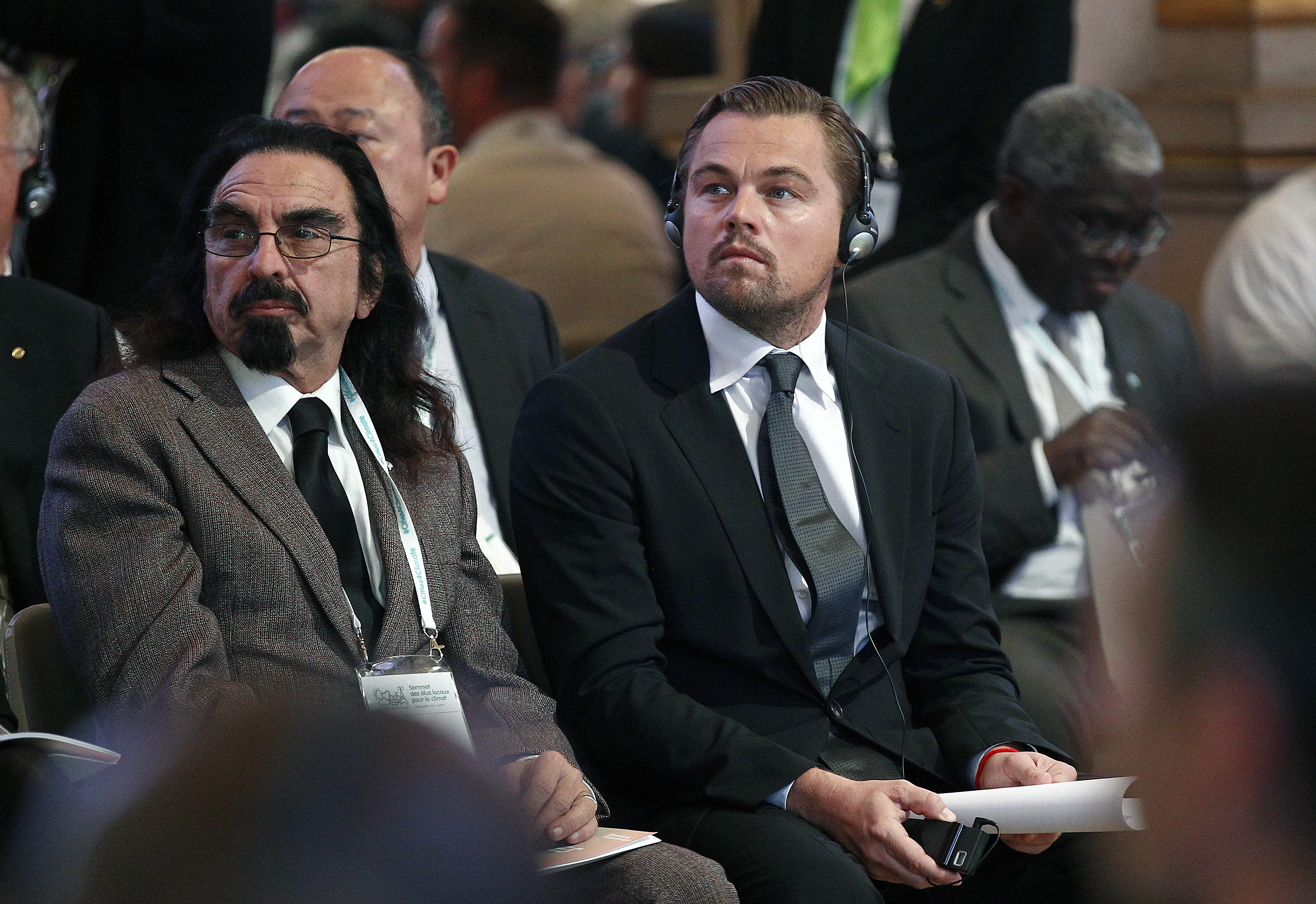 Leonardo DiCaprio and his father George DiCaprio attend a conference on climate change on December 4, 2015 in Paris, France | Source: Getty Images