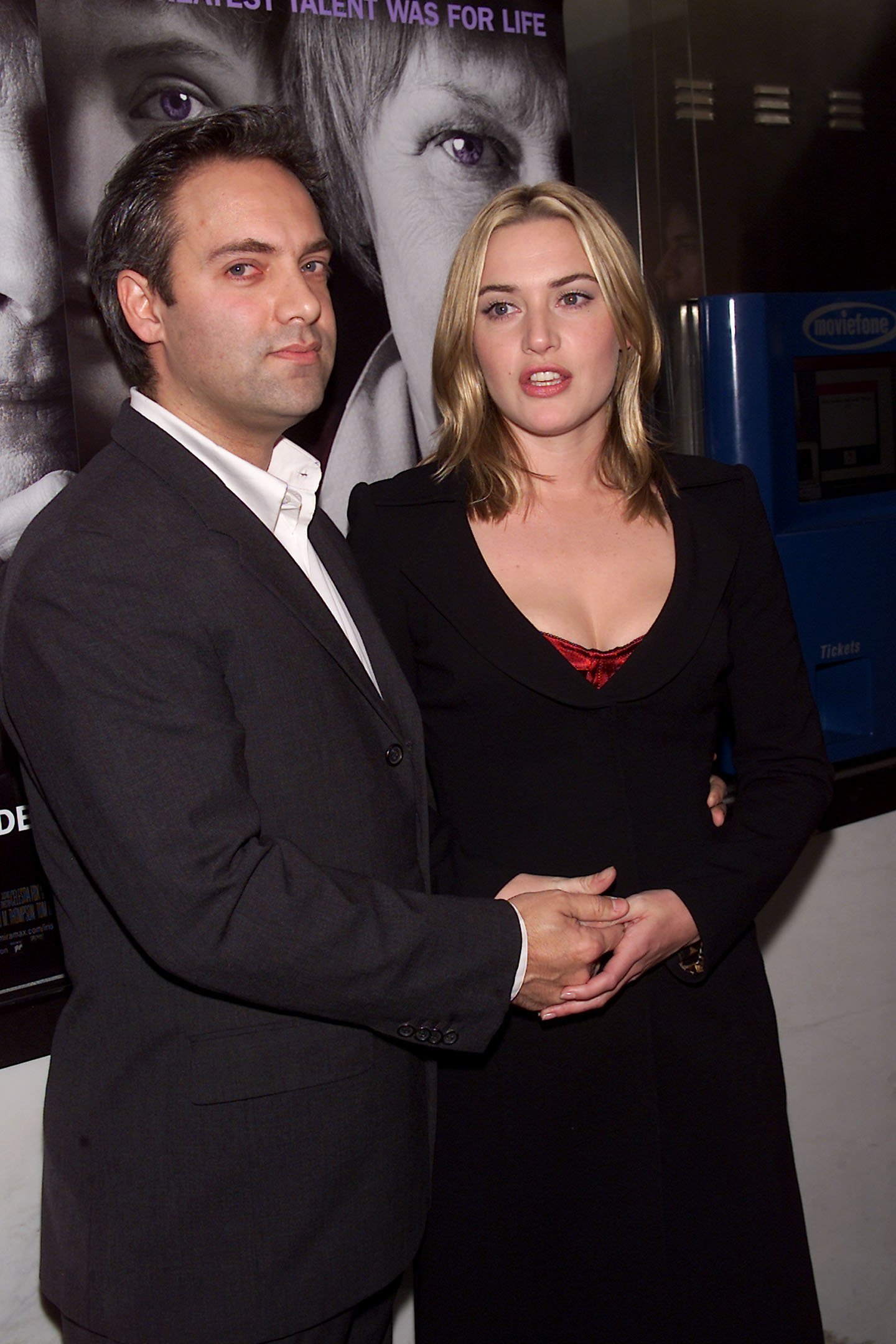 Actress Kate Winslet with Sam Mendes arriving at the world film premiere of Miramax's "Iris" on December 02, 2001 at the Paris Theatre in New York City | Source: Getty Images 