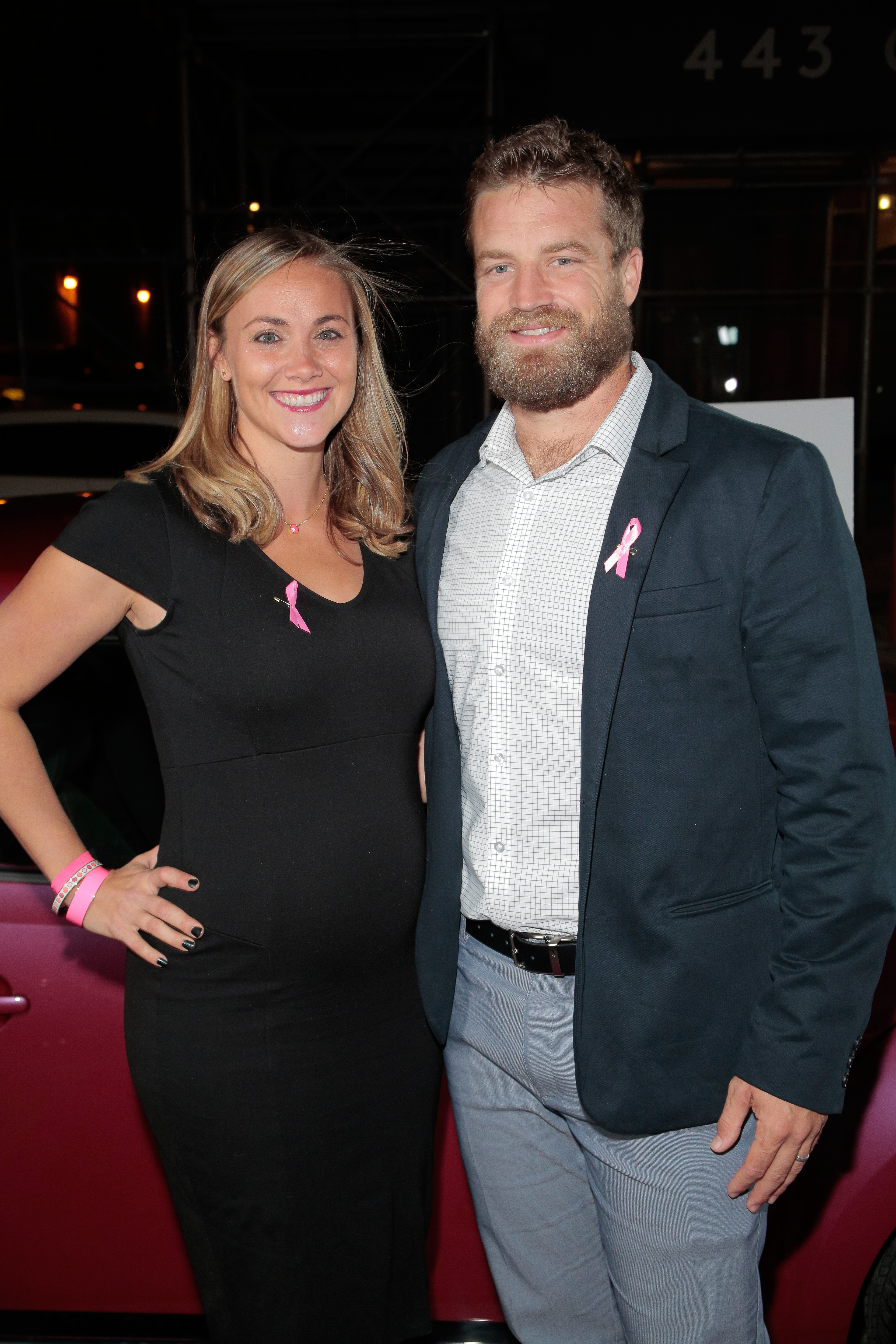 Liza Barber and Ryan Fitzpatrick pose outside during The Pink Agenda Gala on October 13, 2016, in New York City | Source: Getty Images