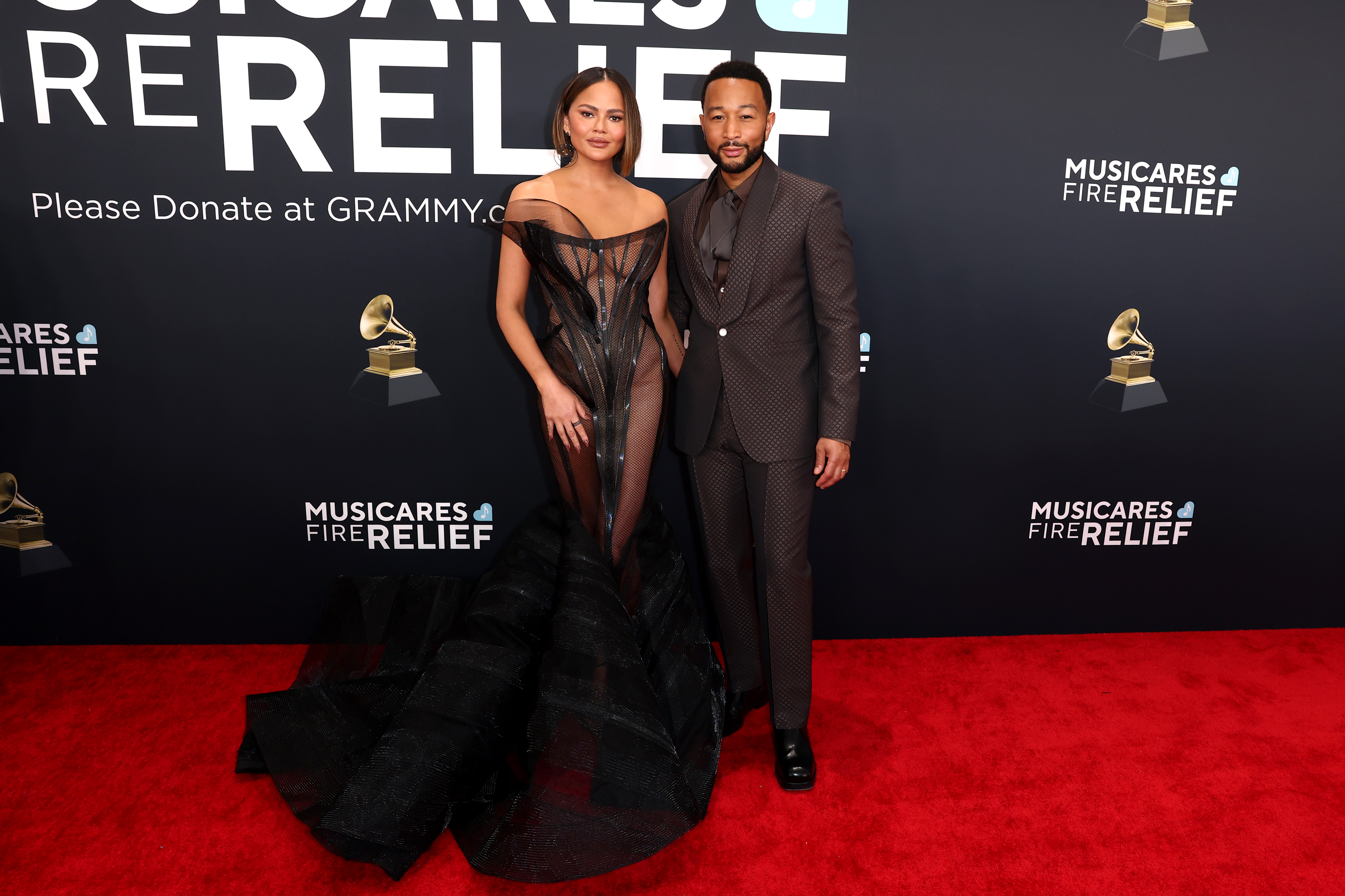 Chrissy Teigen and John Legend arrive at the 67th Annual Grammy Awards on February 2, 2025, in Los Angeles, California. | Source: Getty Images