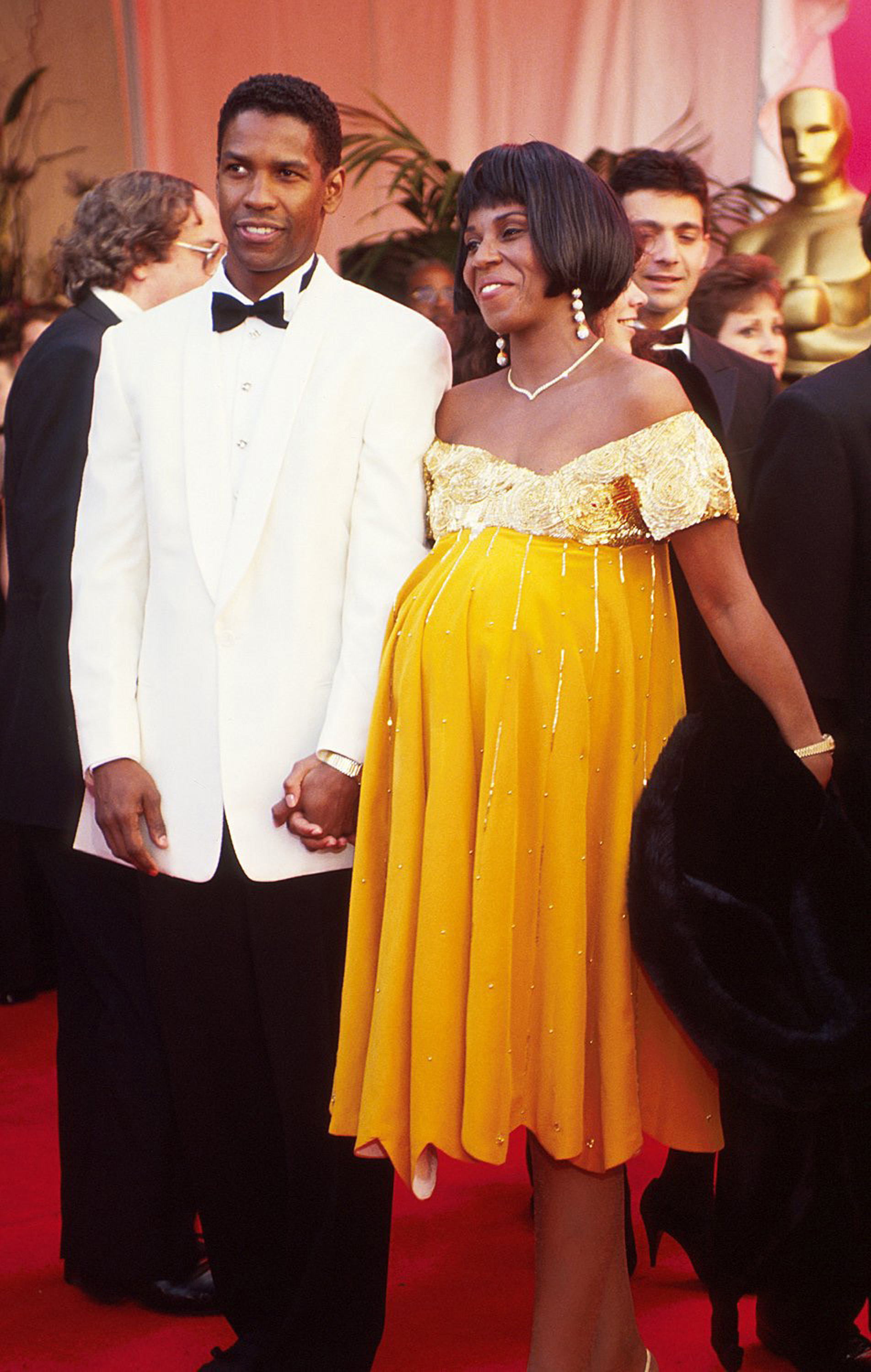 El actor Denzel Washington con su esposa Pauletta en la 63 edición de los Oscar. Alrededor de 1991. | Foto: Getty Images