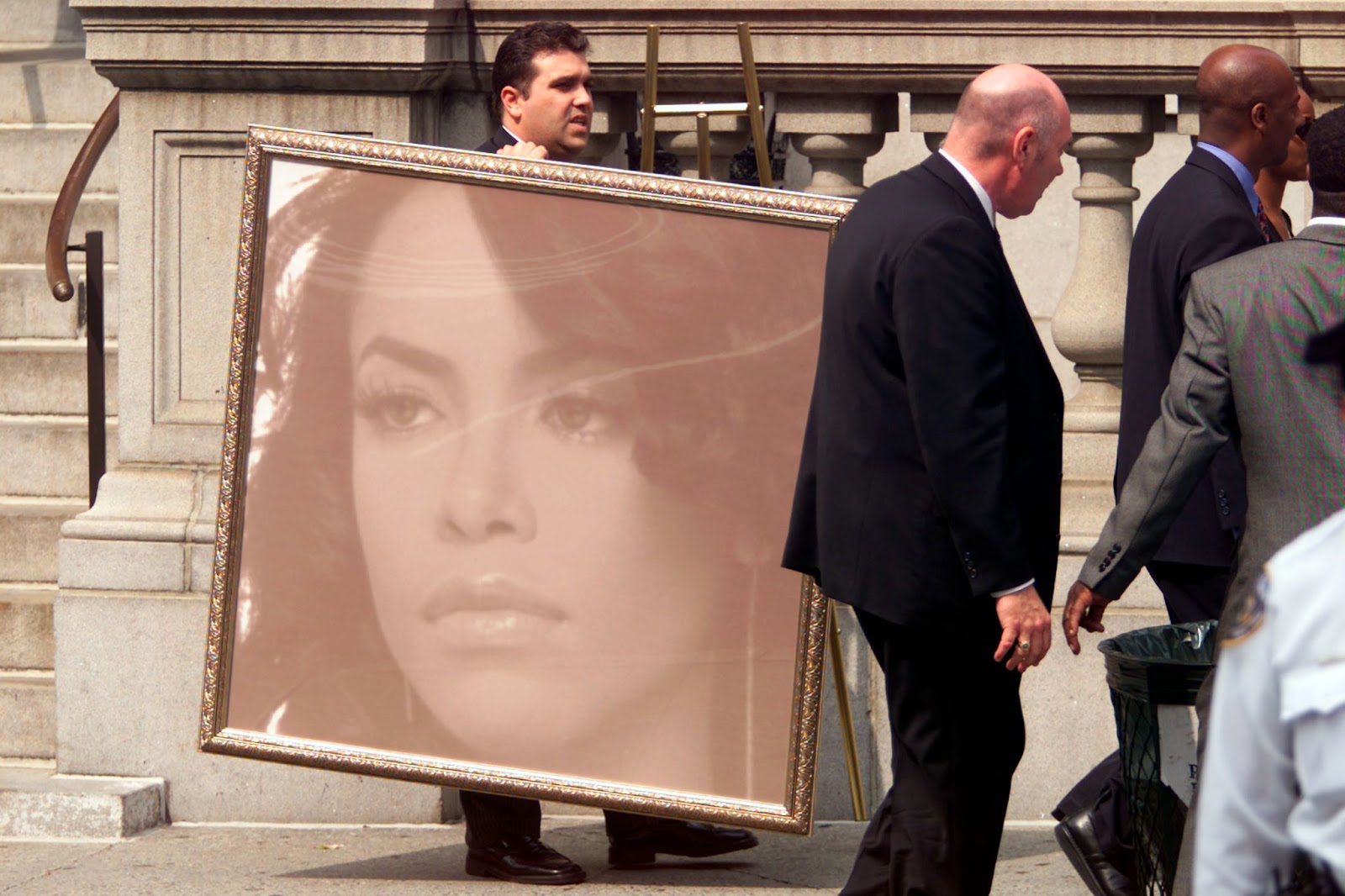 A portrait of Aaliyah at her memorial service at St. Ignatius Loyola Roman Catholic Church on August 31, 2001, in New York. | Source: Getty Images