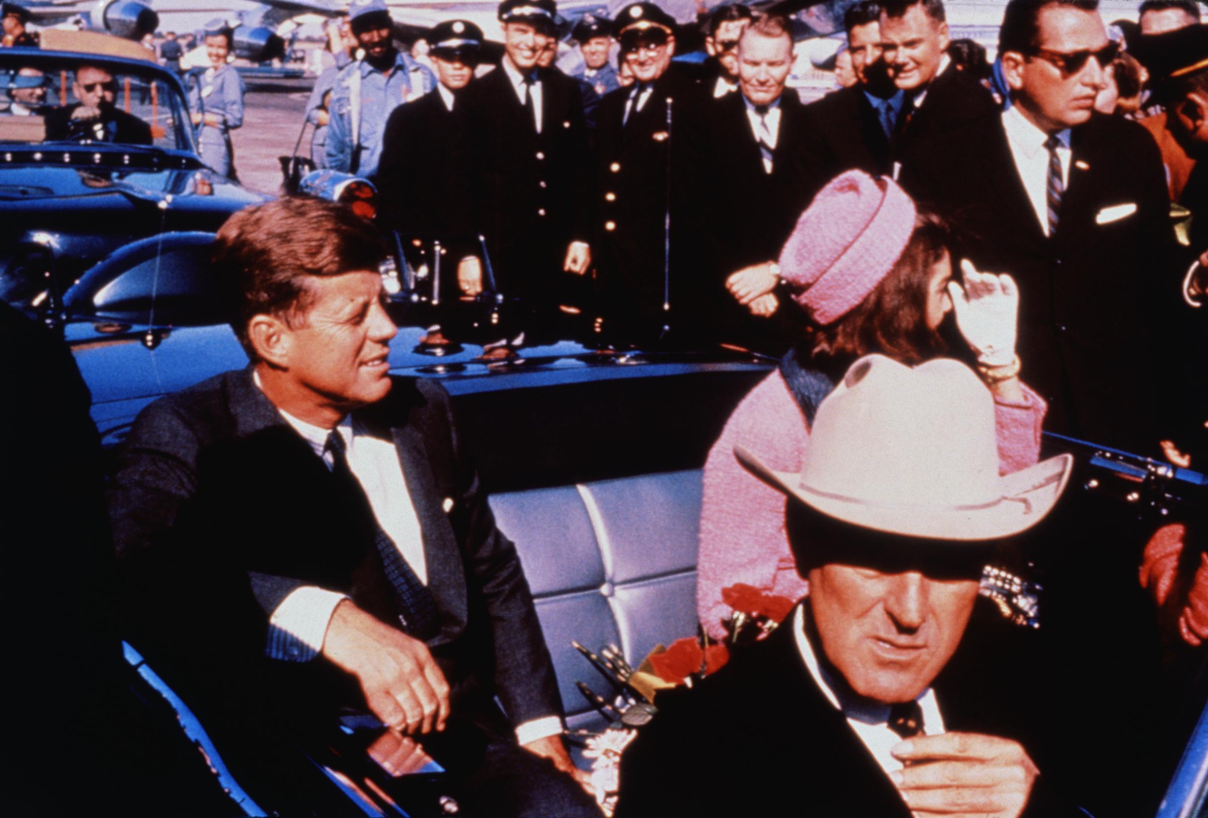 US President John F. Kennedy and First Lady Jacqueline Kennedy in a motorcade from the airport on November 22, 1963 | Source: Getty Images