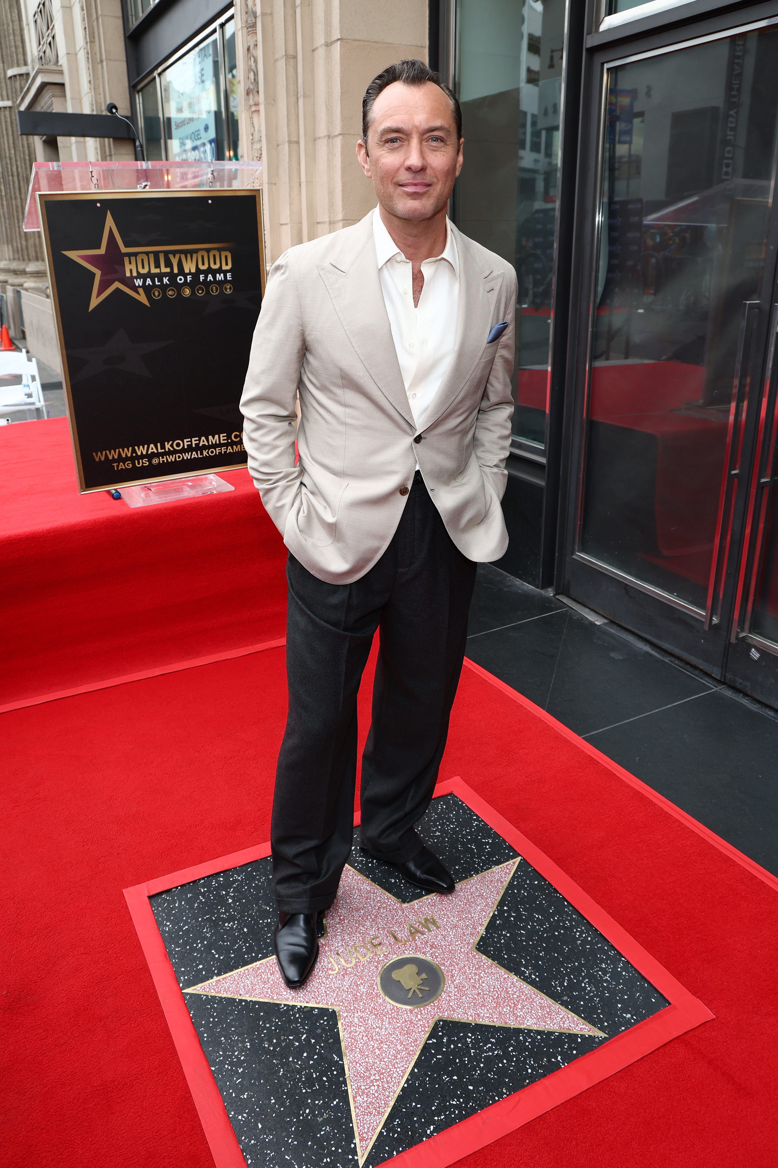 Jude Law attends his Hollywood Walk of Fame Star Ceremony on December 12, 2024, in Hollywood, California | Source: Getty Images