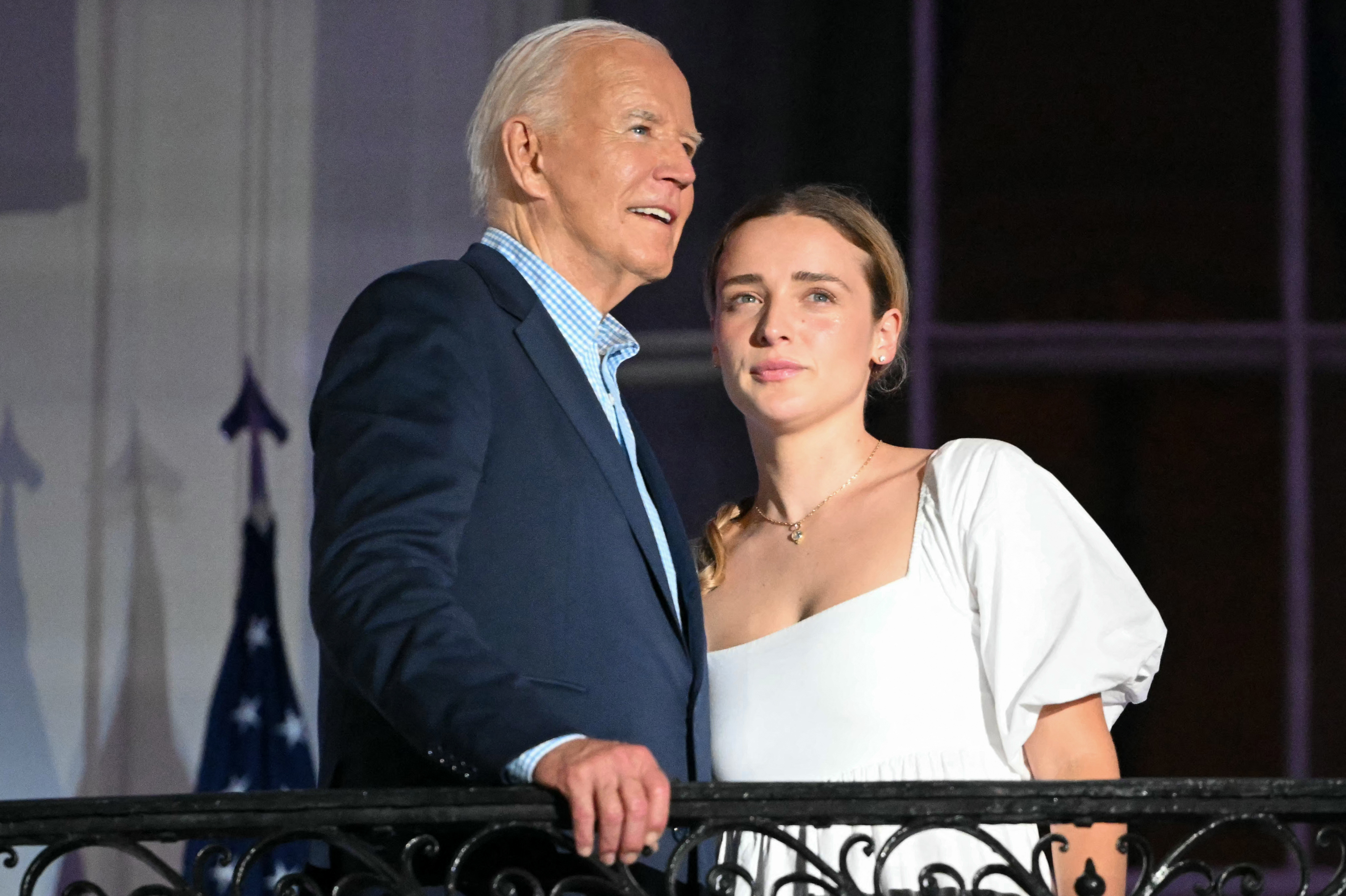 US President Joe Biden and Finnegan Biden watch the Independence Day fireworks display from the Truman Balcony of the White House in Washington, D.C., on July 4, 2024 | Source: Getty Images